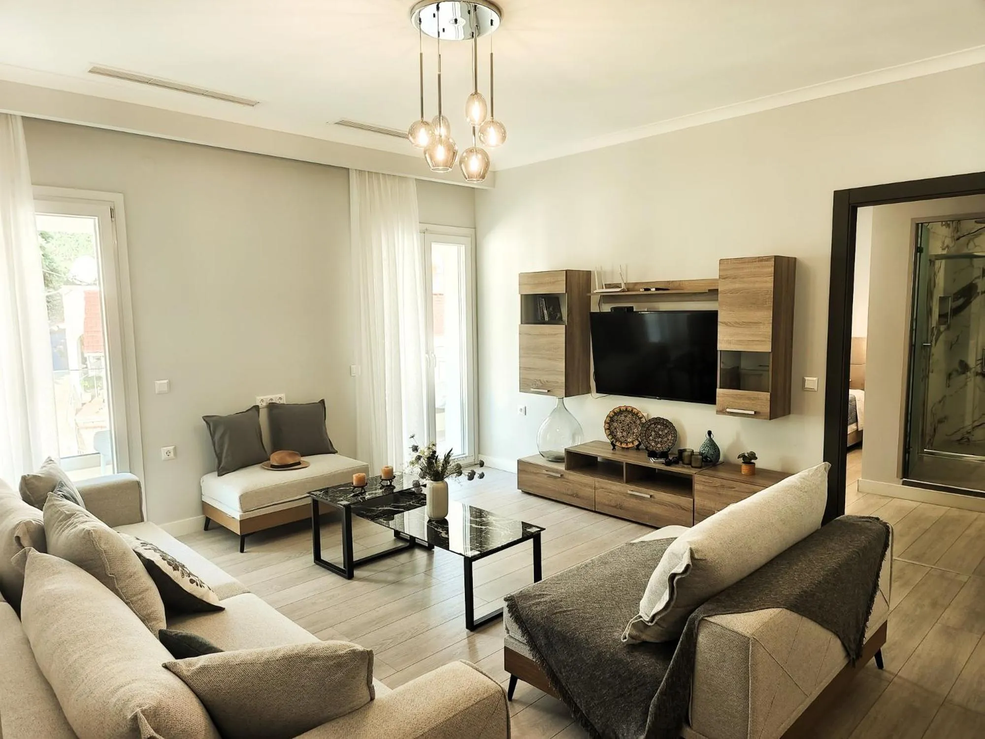 Living room in Pelagia Apartment by Kormaris