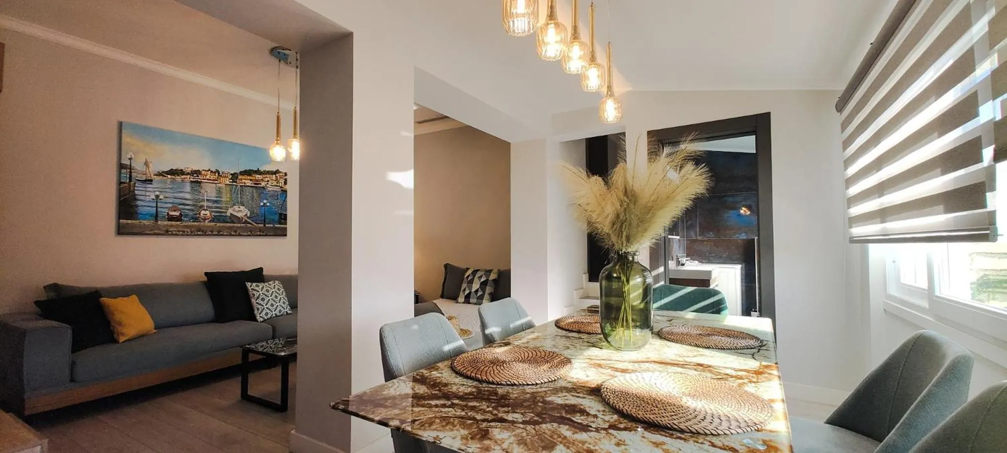 Dining area in Pelagia Apartment by Kormaris