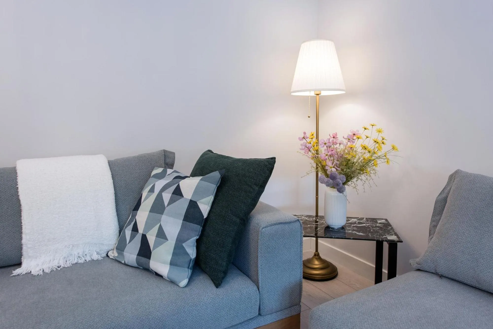 Seating area in Pelagia Apartment by Kormaris