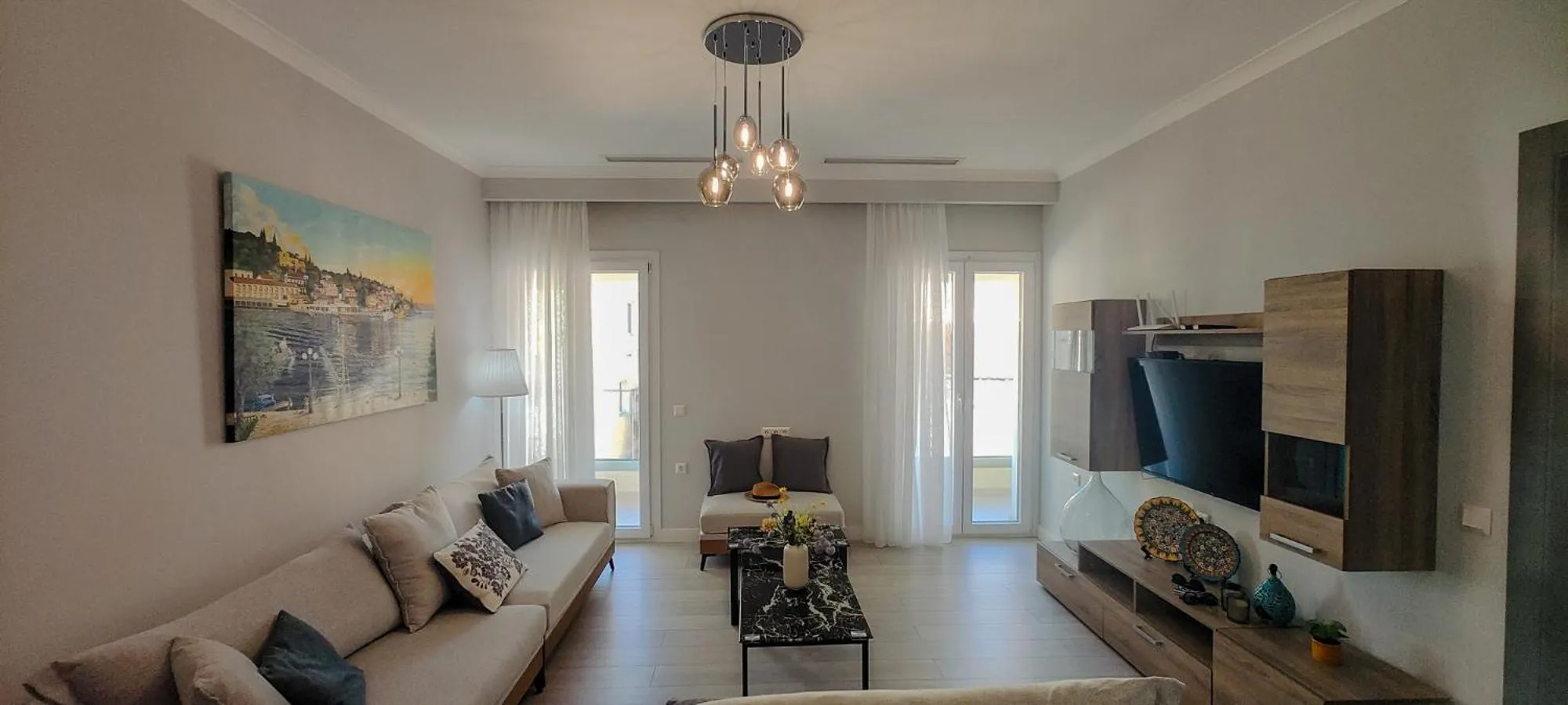 Living room in Pelagia Apartment by Kormaris