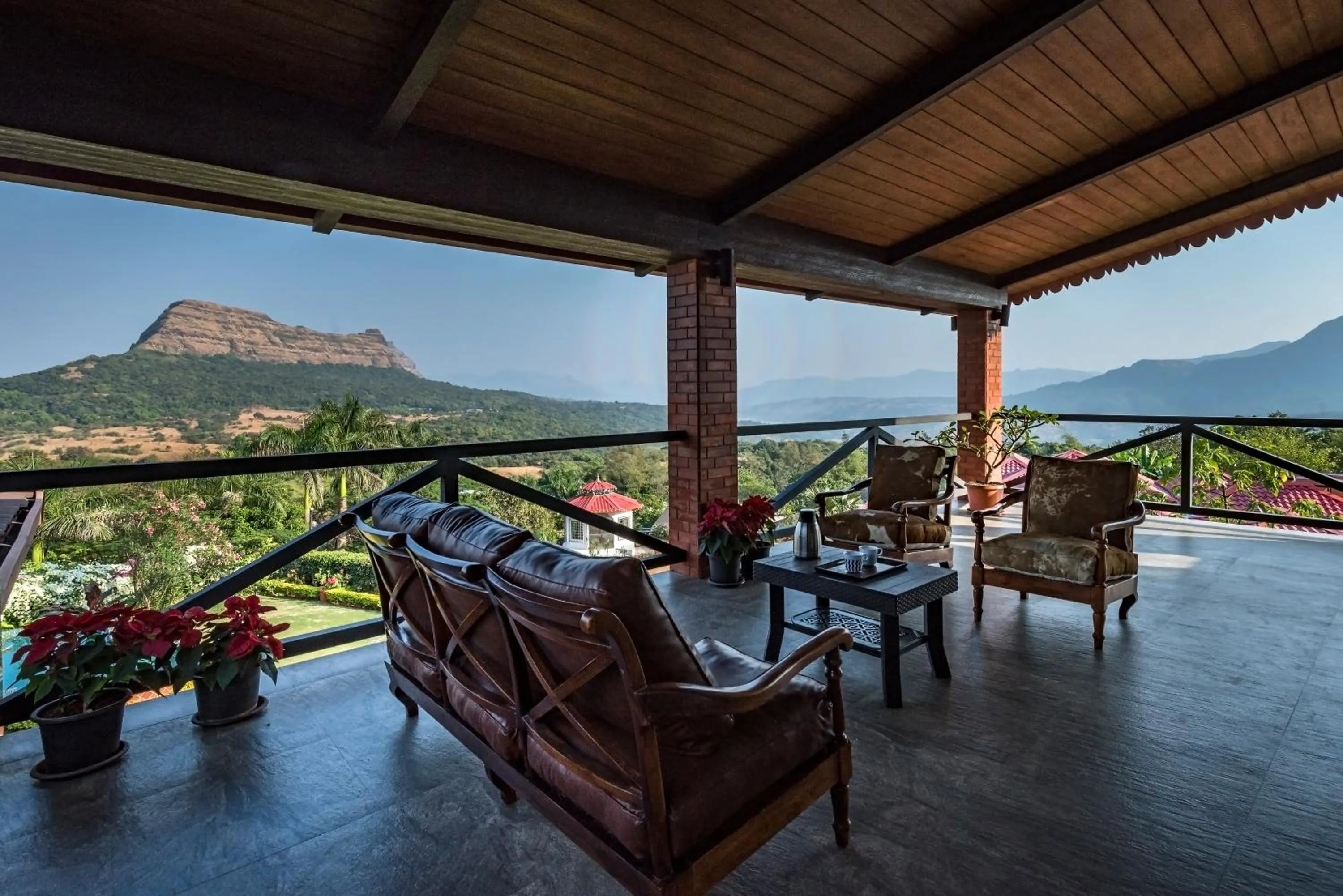Patio in SaffronStays Althea - 4BR veg-only luxury villa with pool, jacuzzis, gourmet meals and Lohagad-Pawna lake views