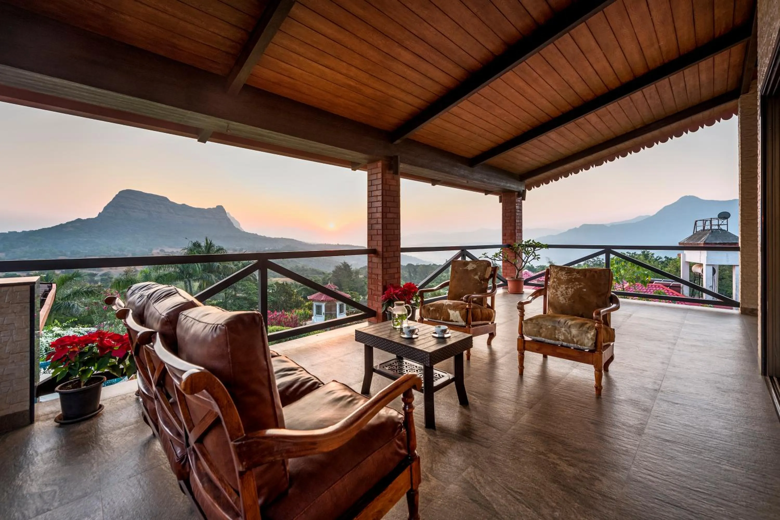 Patio in SaffronStays Althea - 4BR veg-only luxury villa with pool, jacuzzis, gourmet meals and Lohagad-Pawna lake views