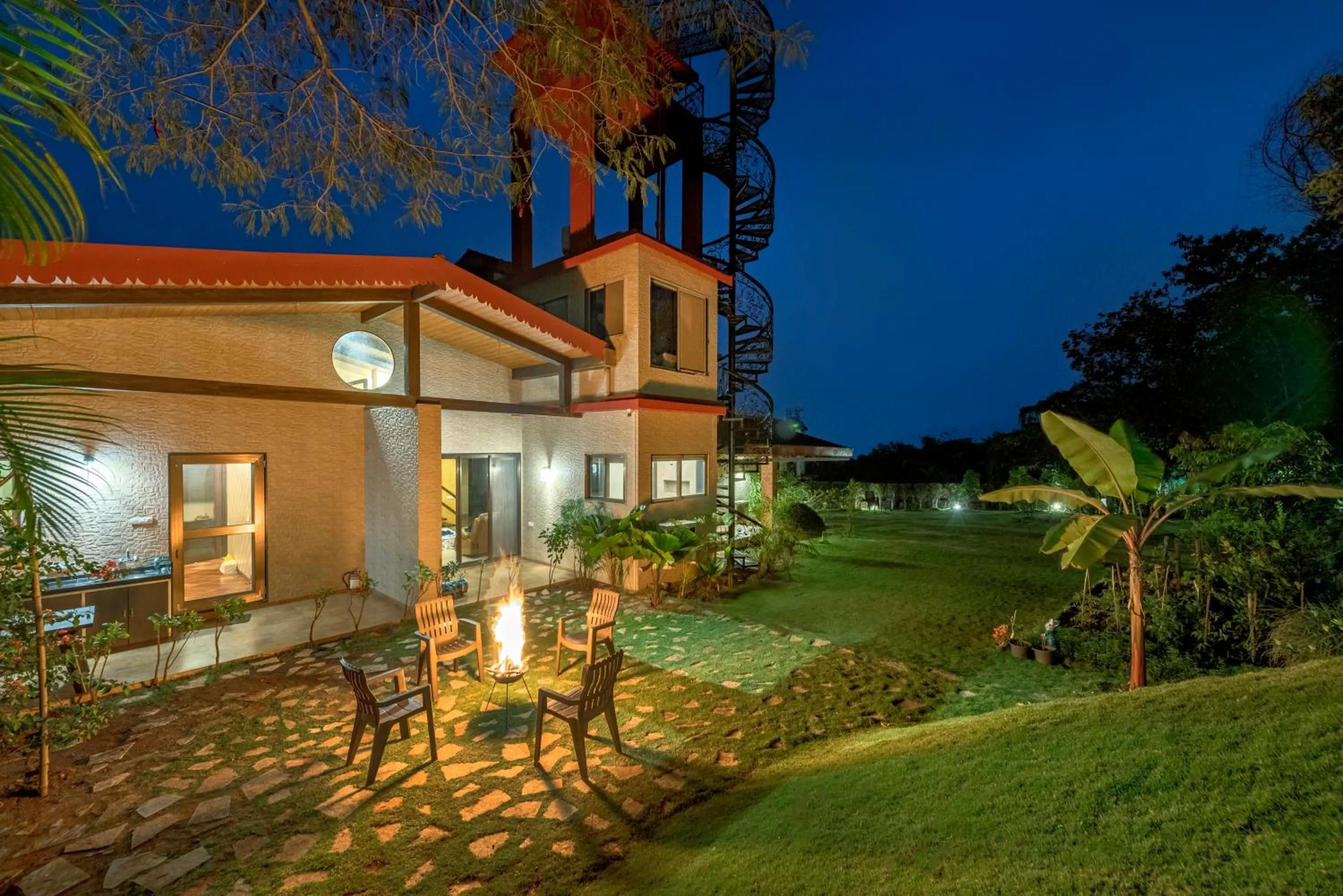 Property building in SaffronStays Althea - 4BR veg-only luxury villa with pool, jacuzzis, gourmet meals and Lohagad-Pawna lake views