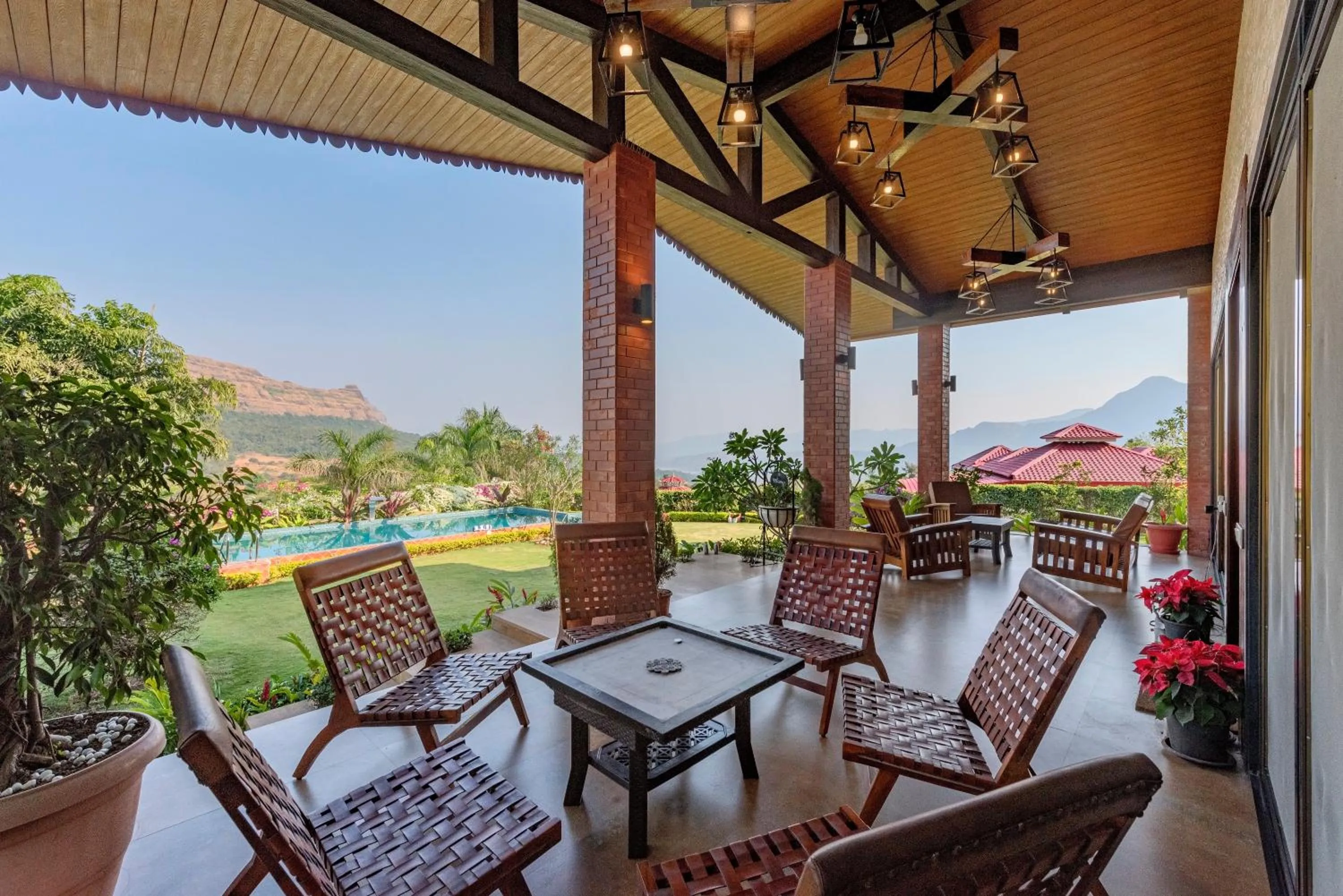 Patio in SaffronStays Althea - 4BR veg-only luxury villa with pool, jacuzzis, gourmet meals and Lohagad-Pawna lake views