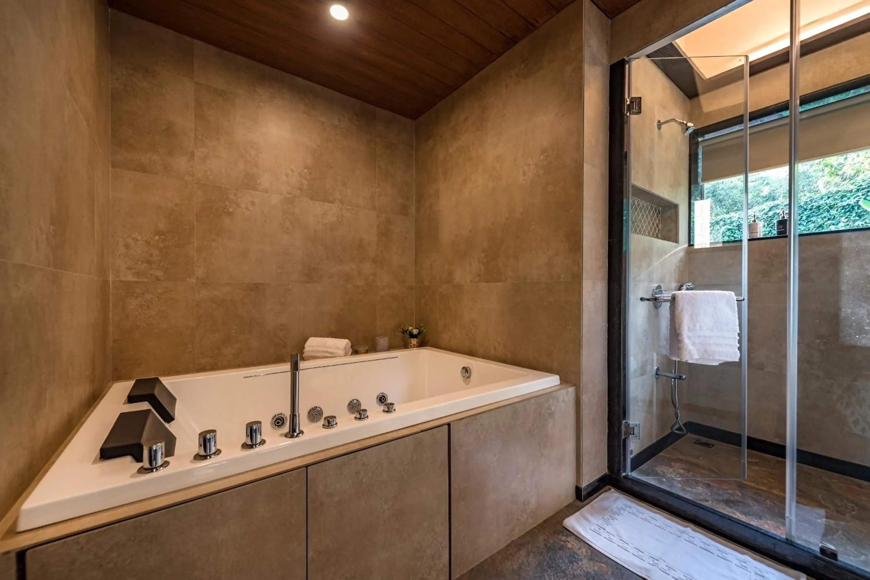 Shower in SaffronStays Althea - 4BR veg-only luxury villa with pool, jacuzzis, gourmet meals and Lohagad-Pawna lake views