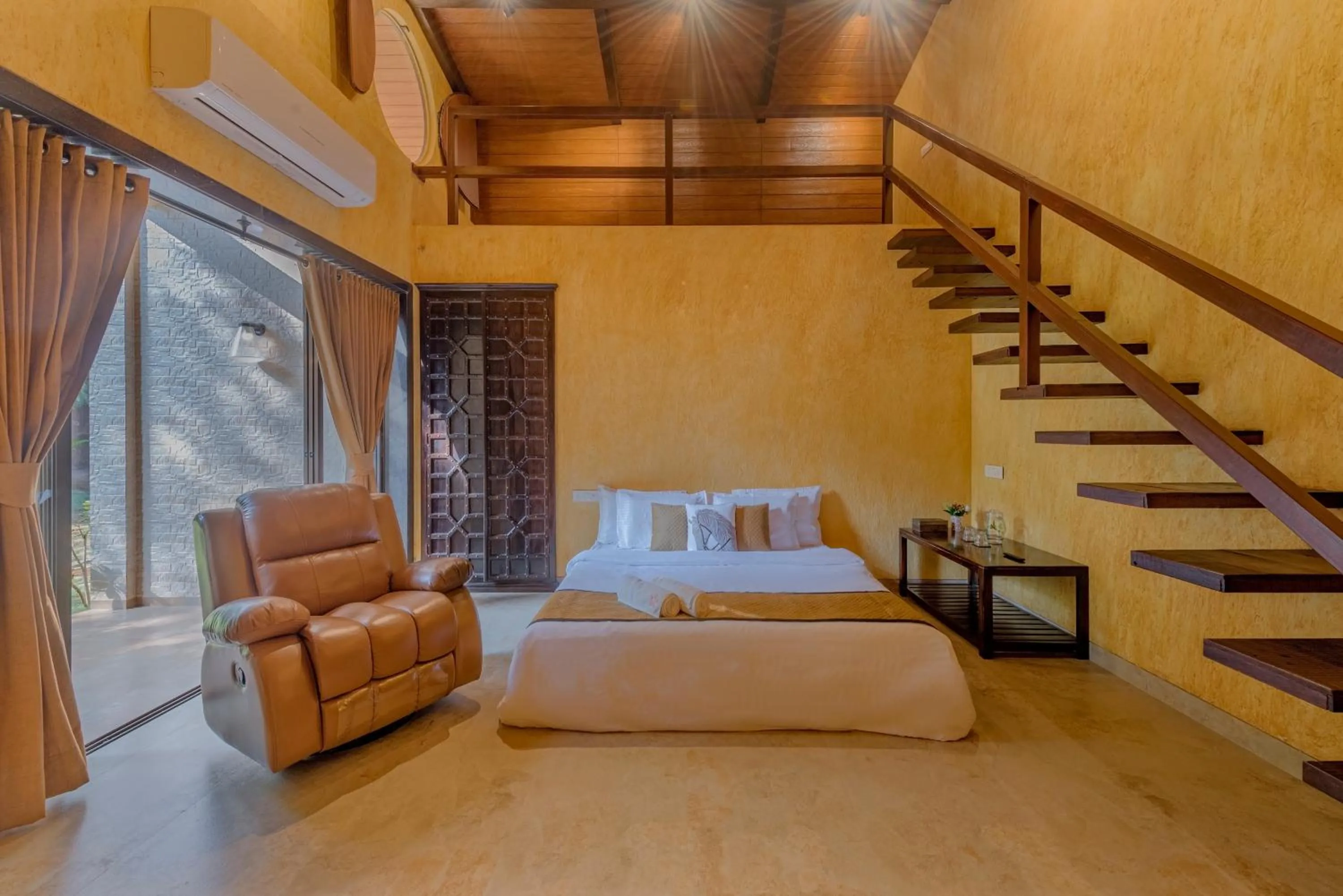 Bed in SaffronStays Althea - 4BR veg-only luxury villa with pool, jacuzzis, gourmet meals and Lohagad-Pawna lake views