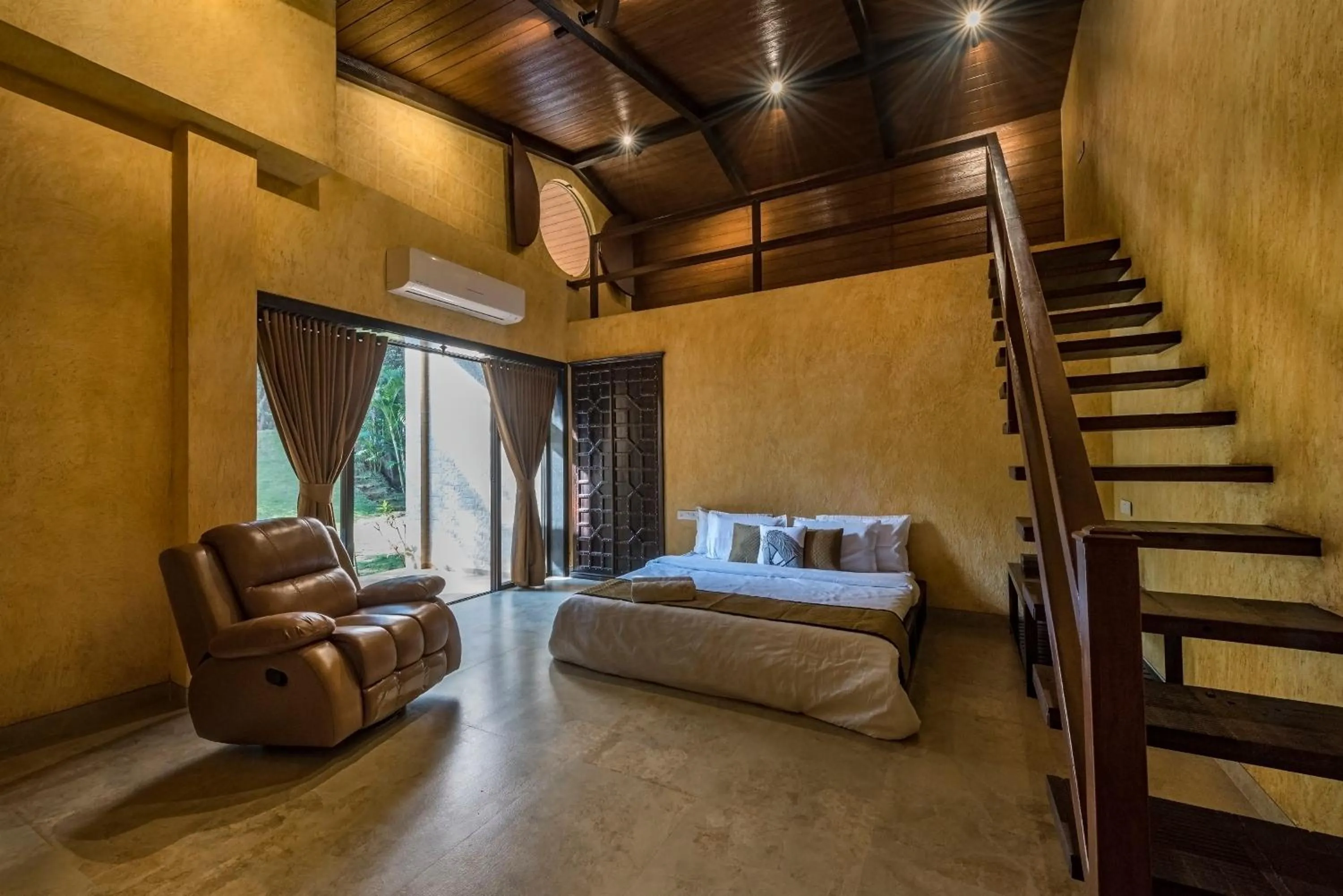 Bed in SaffronStays Althea - 4BR veg-only luxury villa with pool, jacuzzis, gourmet meals and Lohagad-Pawna lake views