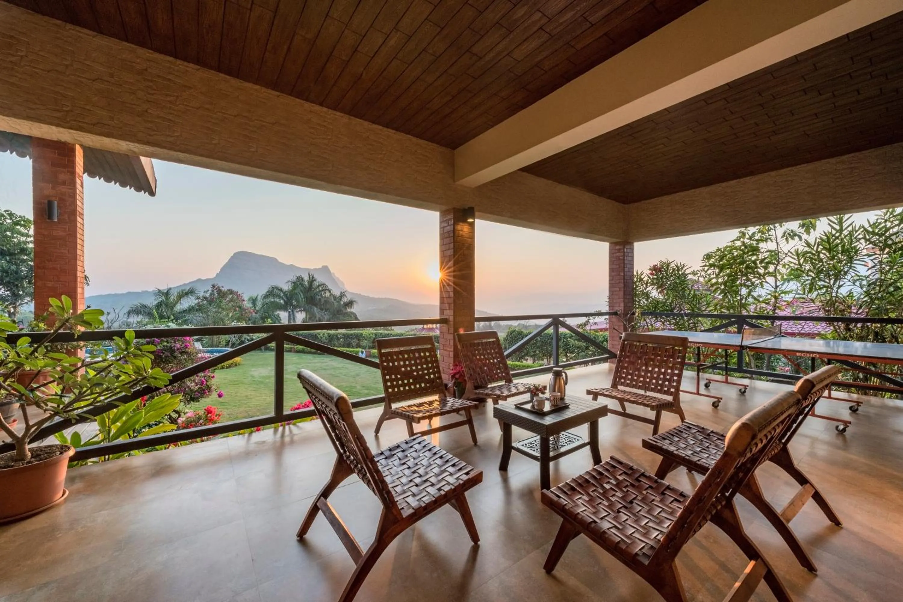 Patio in SaffronStays Althea - 4BR veg-only luxury villa with pool, jacuzzis, gourmet meals and Lohagad-Pawna lake views
