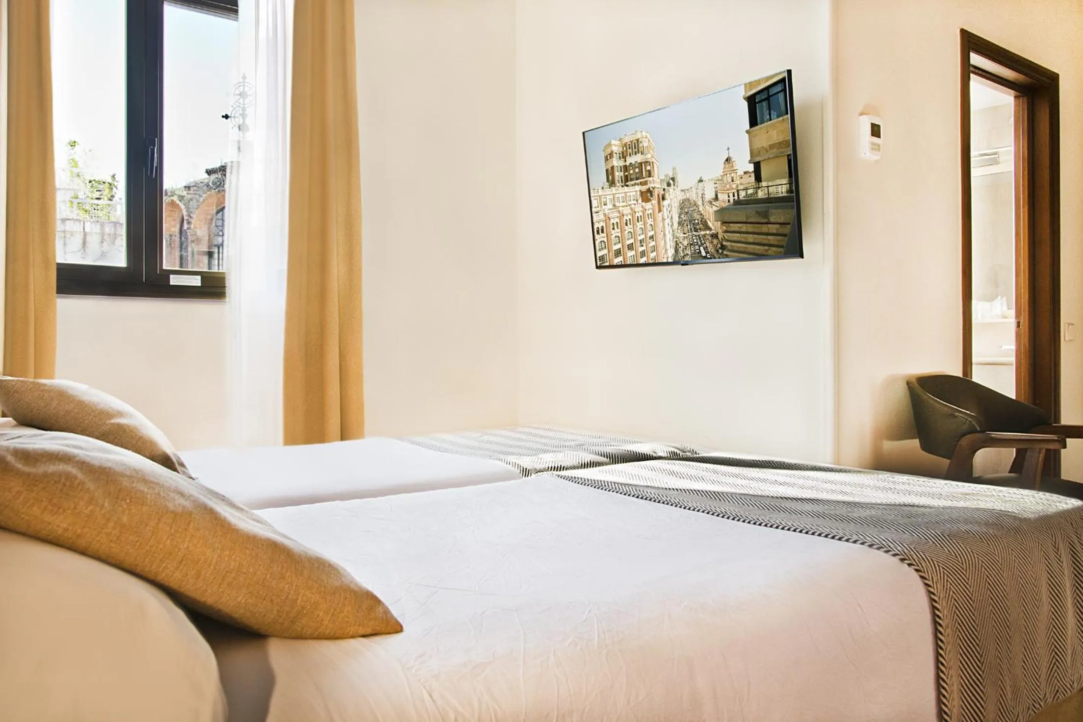 Bed in Hospedium Hotel Los Condes