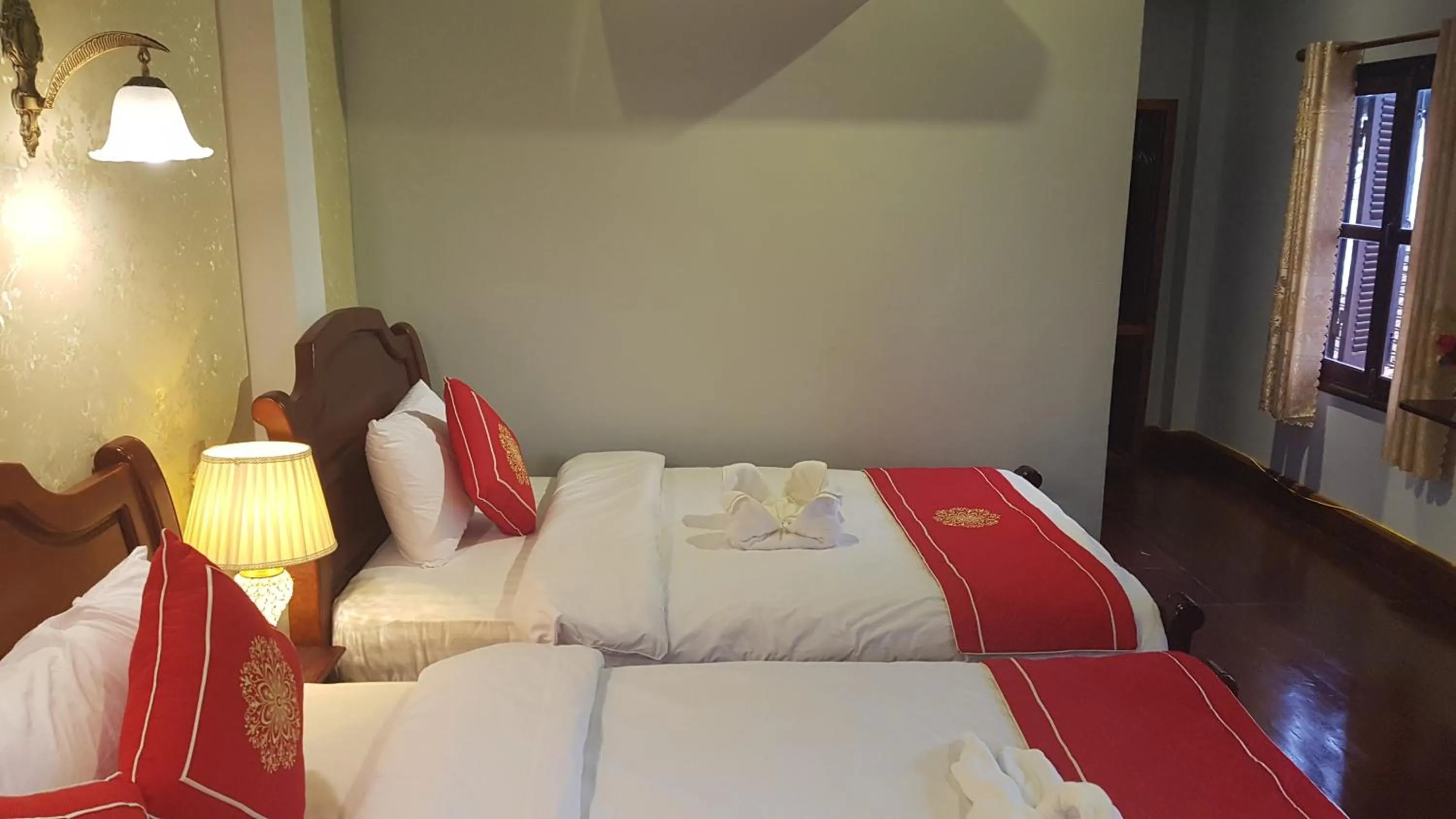 Bed in Luang Prabang Pangkham Lodge