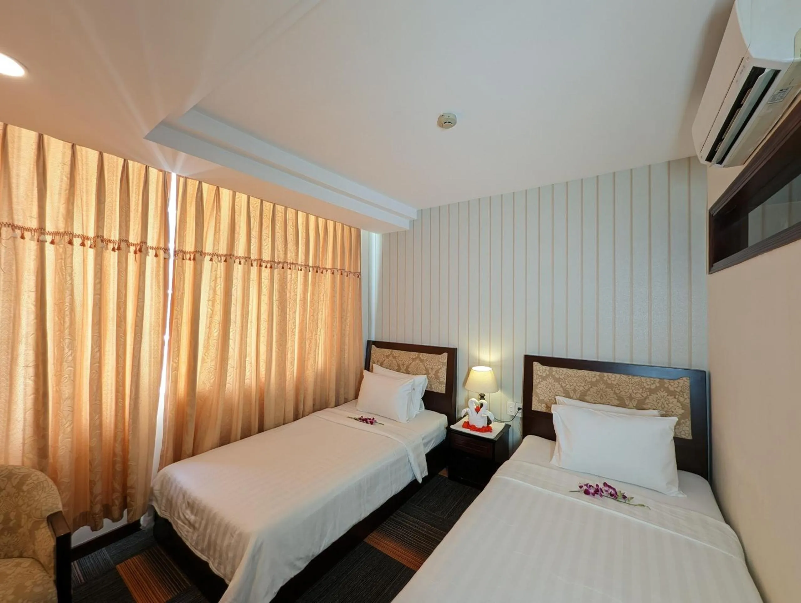 Bed in Đông Kinh Hotel