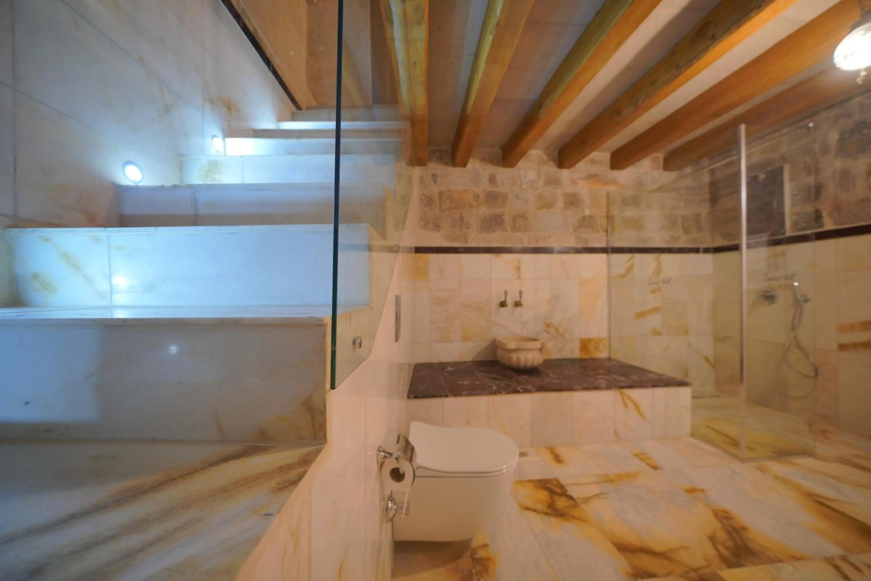 Shower, Bed in Cappadocia Secret Hill Cave Suites