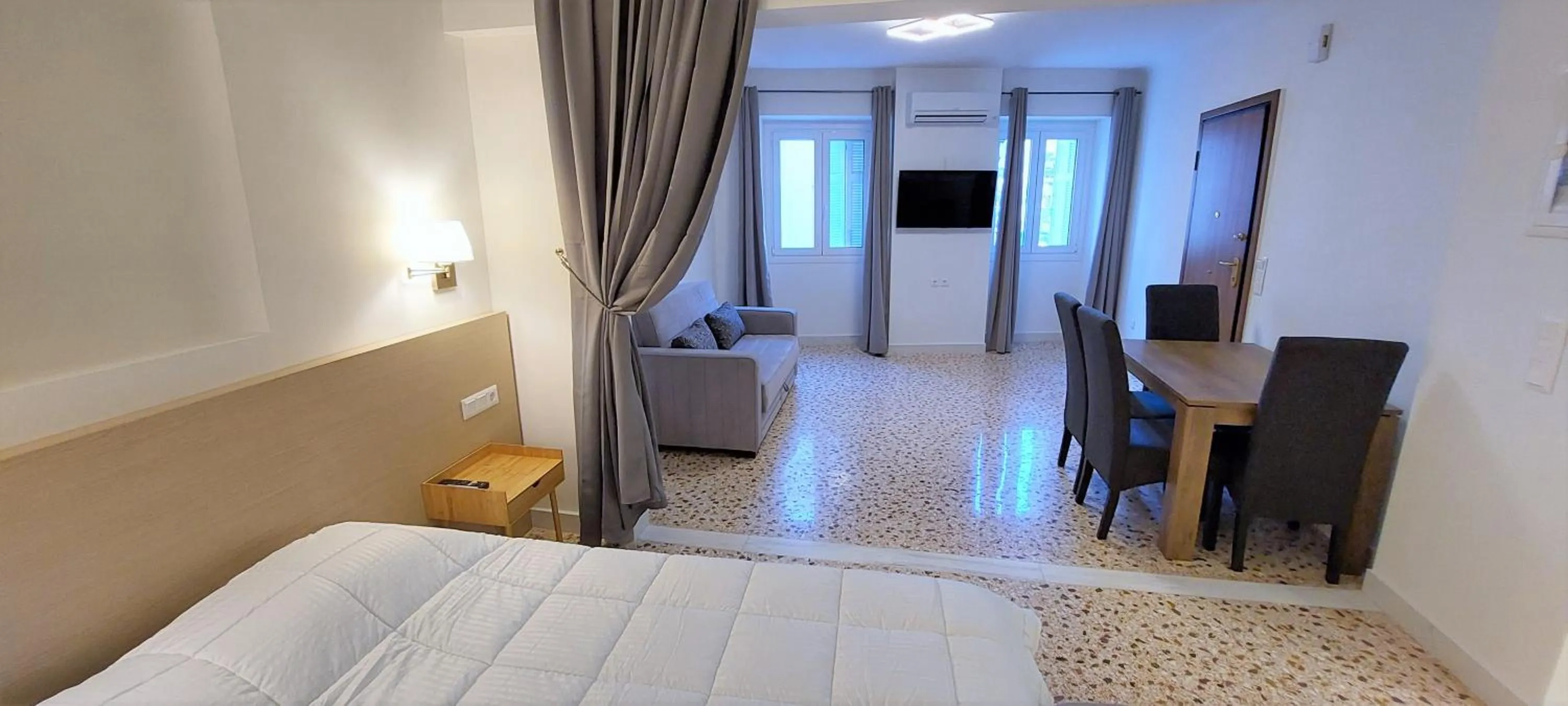 Bed in Athens Plaka Family Suites