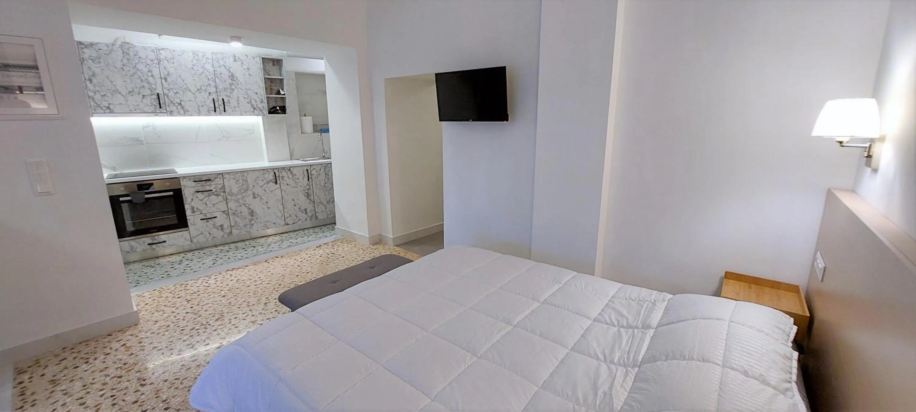 Bed in Athens Plaka Family Suites