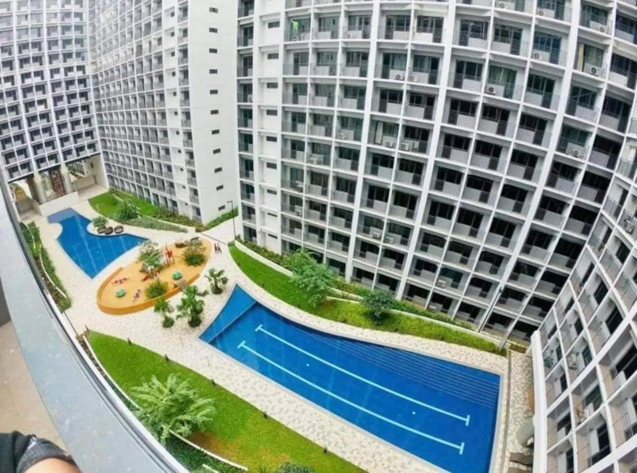 Swimming pool in Deluxe Suites Razelles 2 at Shore 2 Residences Tower 1