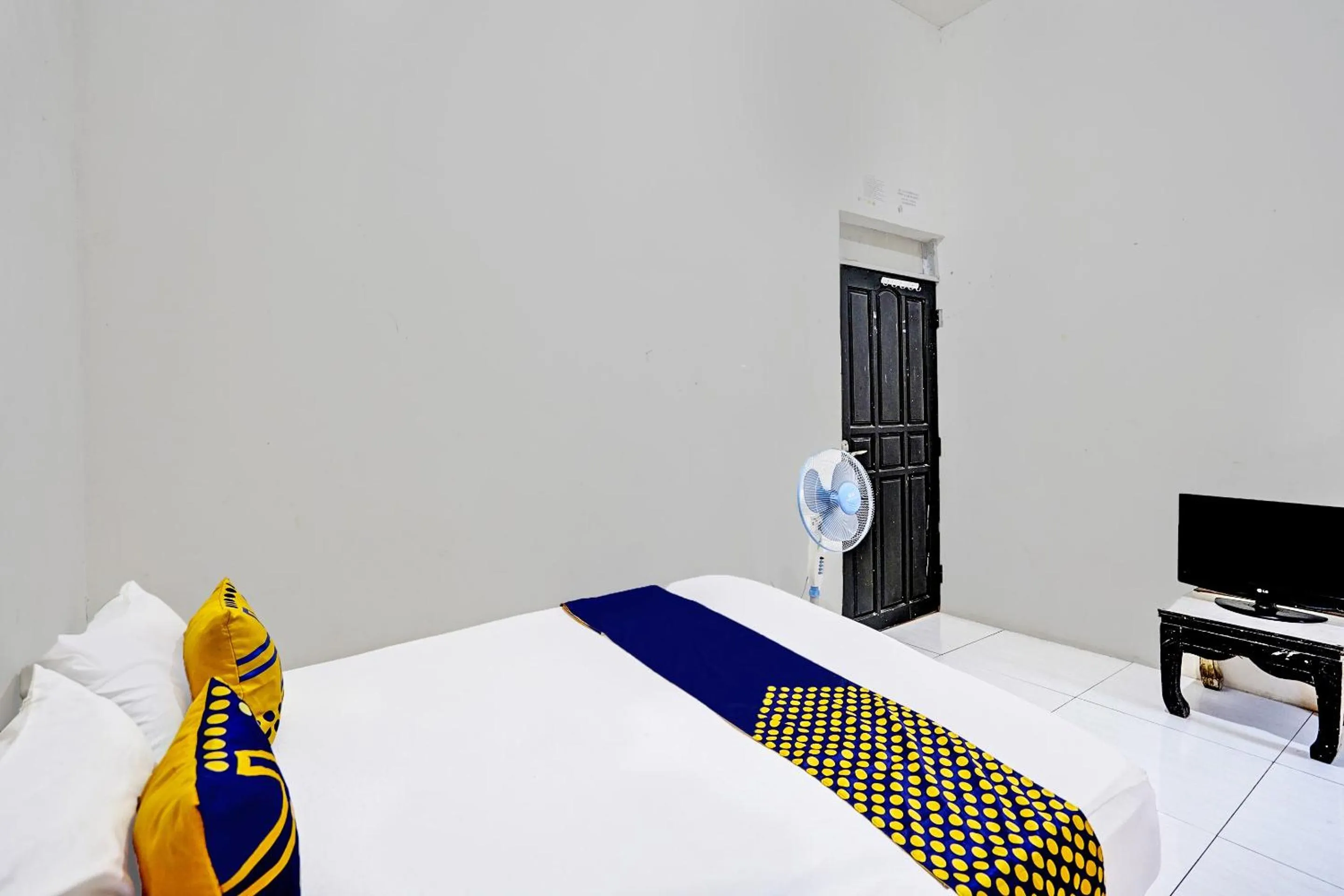 Bedroom, Bed in OYO LIFE 92077 Tarlo Guest House 3