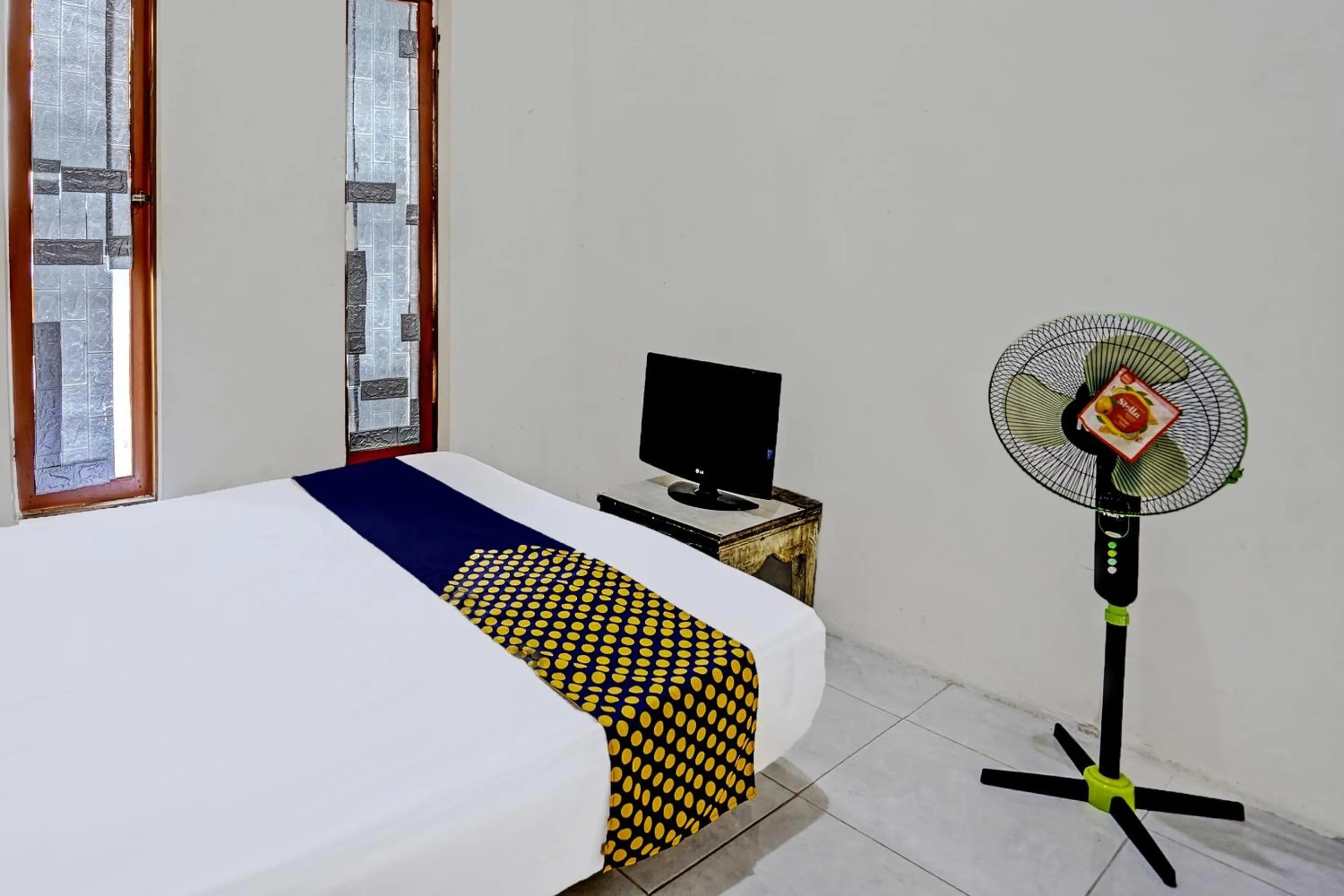 Bedroom, Bed in OYO LIFE 92077 Tarlo Guest House 3