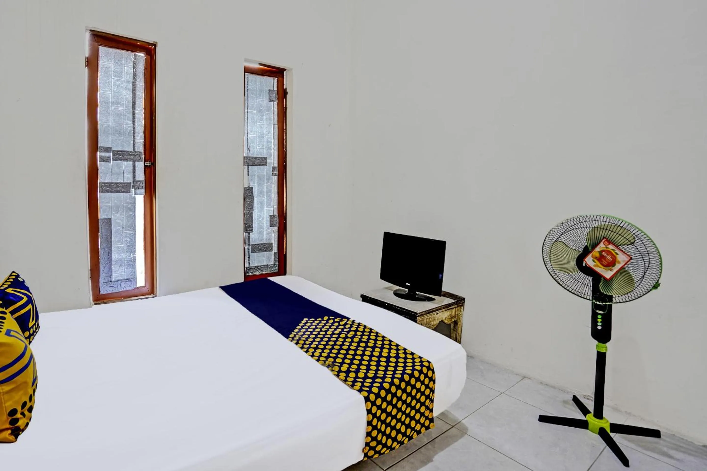 Bedroom, Bed in OYO LIFE 92077 Tarlo Guest House 3