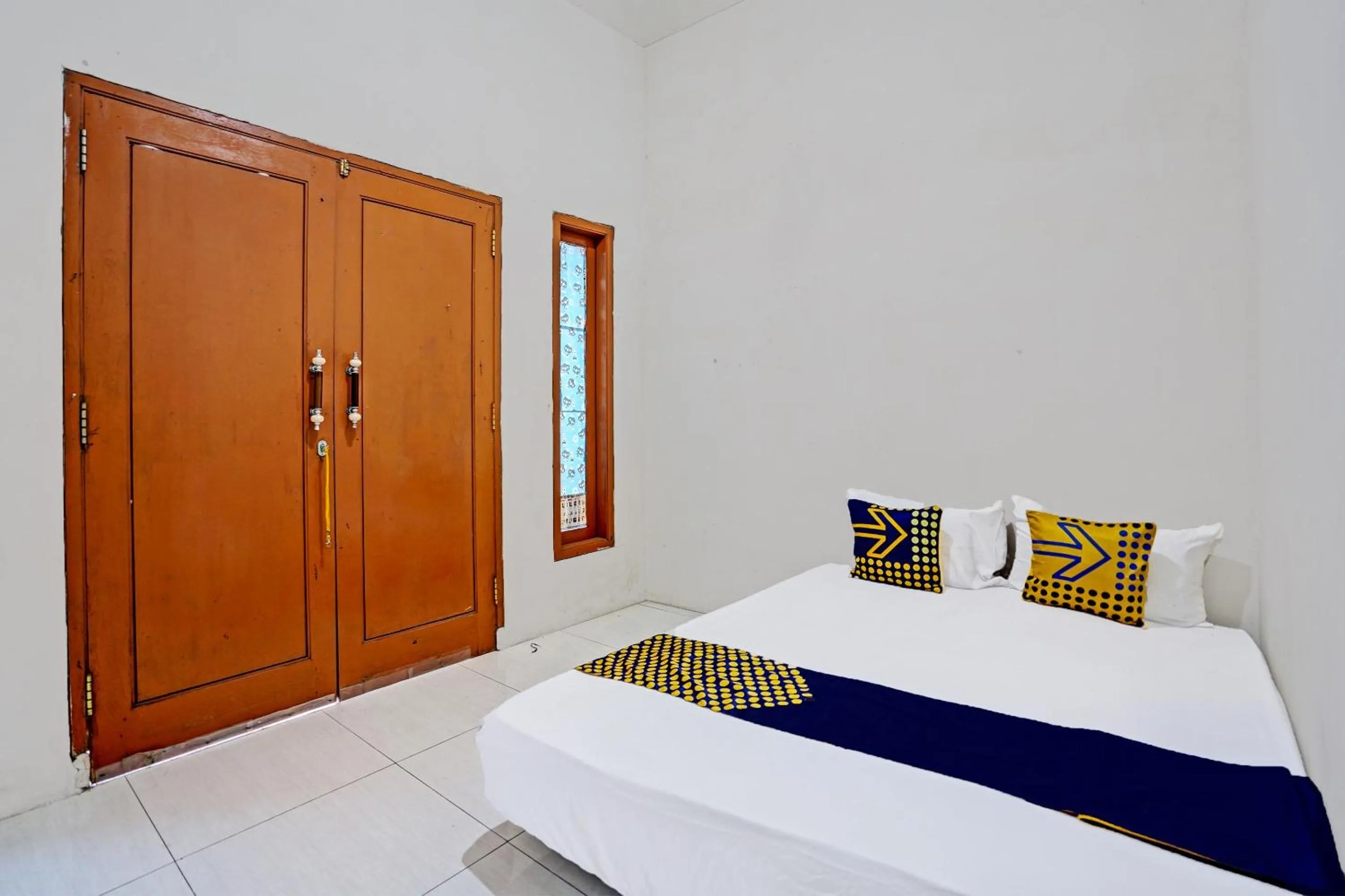 Bedroom, Bed in OYO LIFE 92077 Tarlo Guest House 3