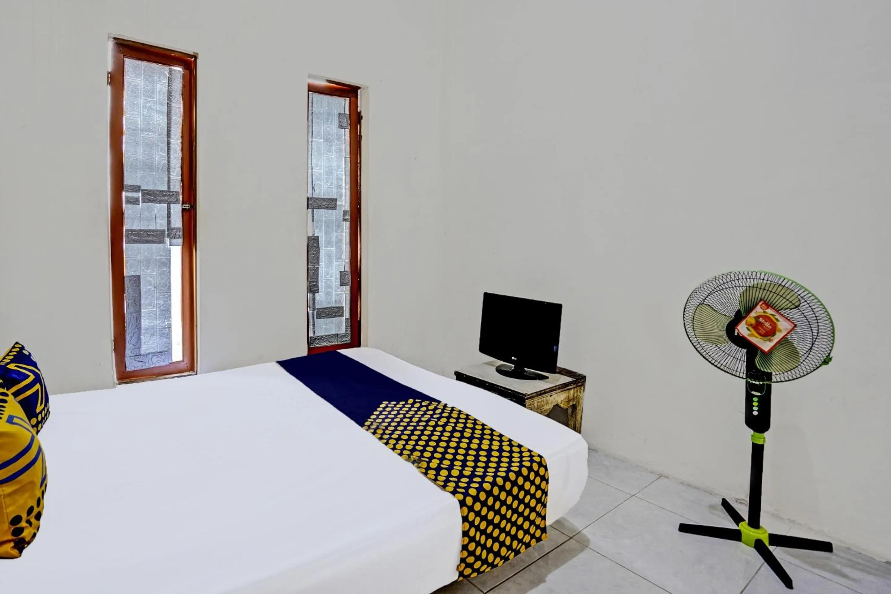 Bedroom, Bed in OYO LIFE 92077 Tarlo Guest House 3