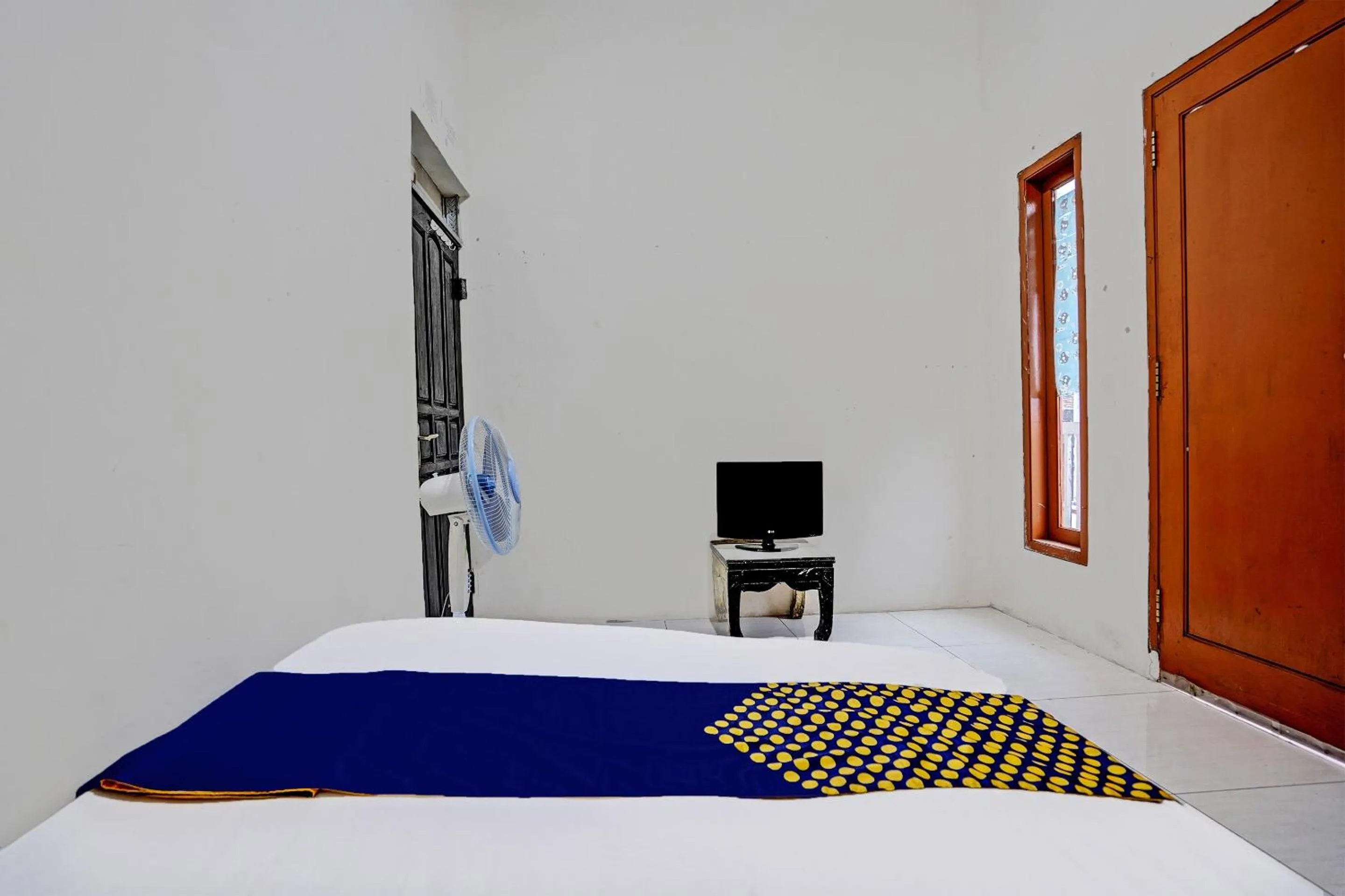 Bedroom, Bed in OYO LIFE 92077 Tarlo Guest House 3