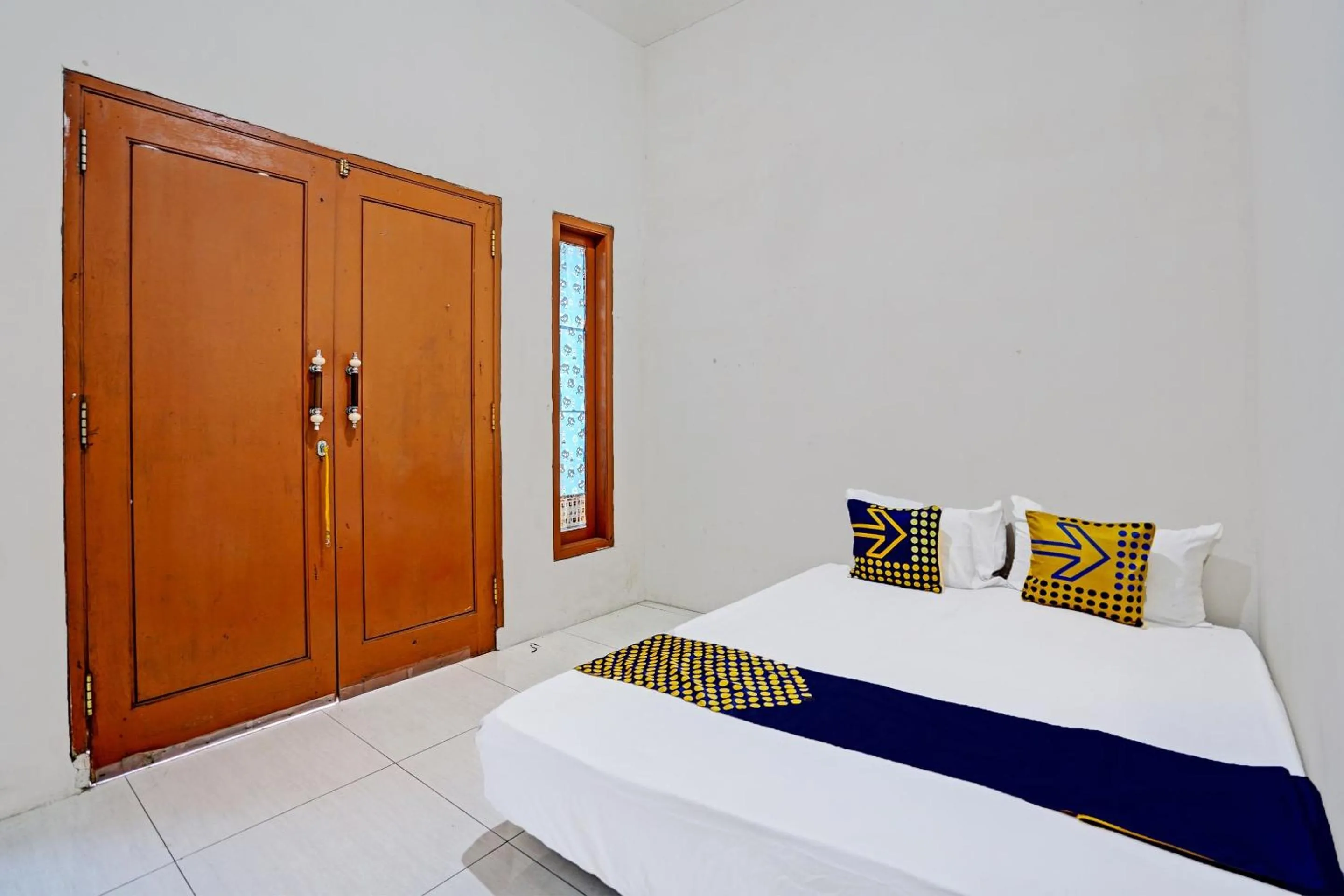 Bedroom, Bed in OYO LIFE 92077 Tarlo Guest House 3