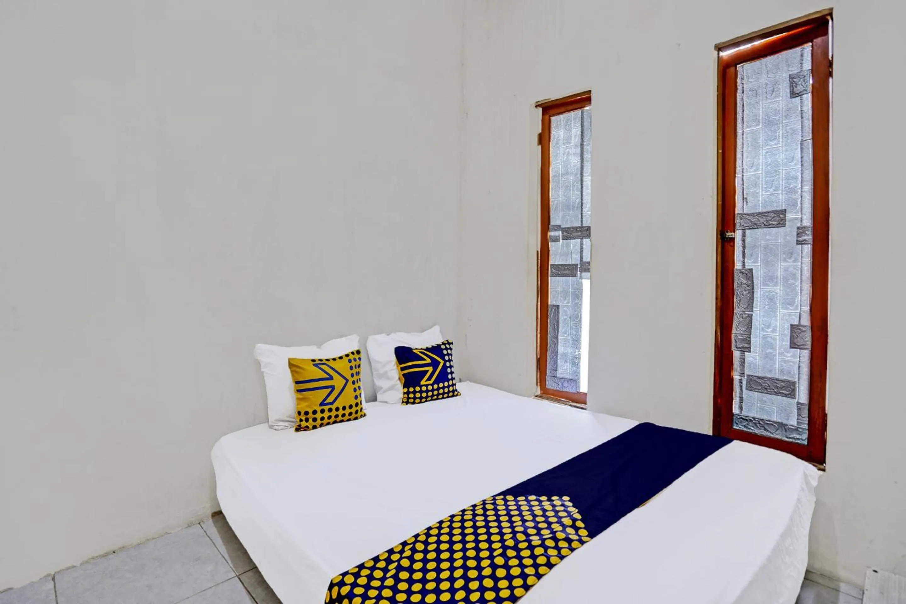 Bedroom, Bed in OYO LIFE 92077 Tarlo Guest House 3