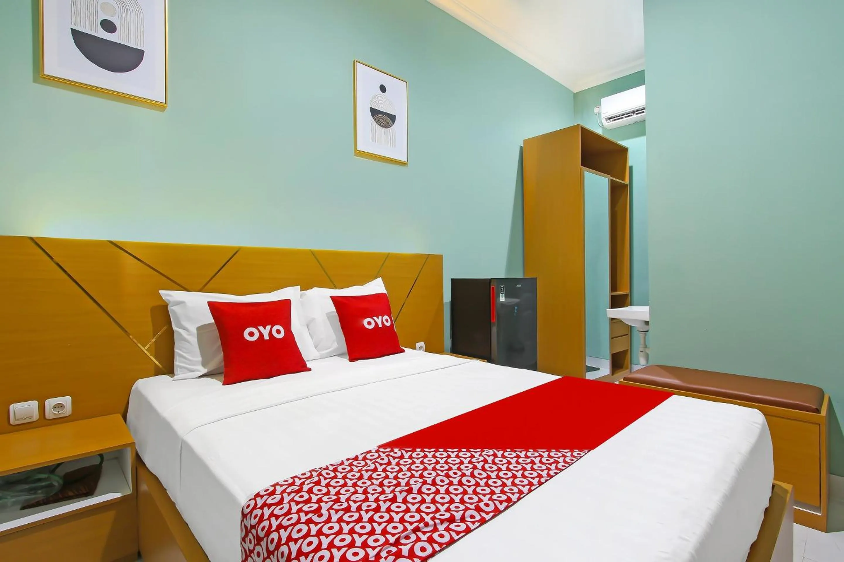 Bedroom in Capital O 92105 A'shanti Inn