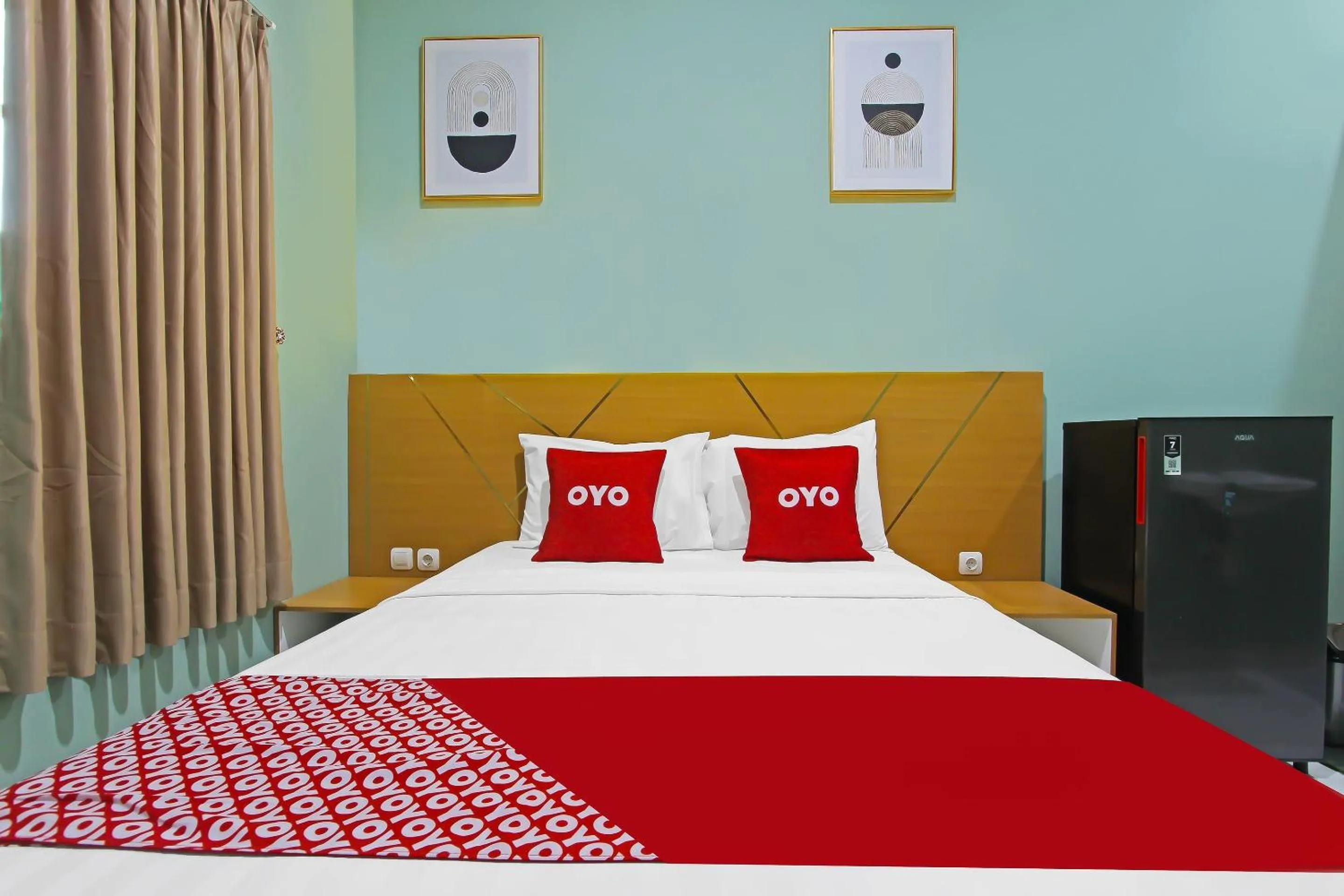 Bedroom in Capital O 92105 A'shanti Inn