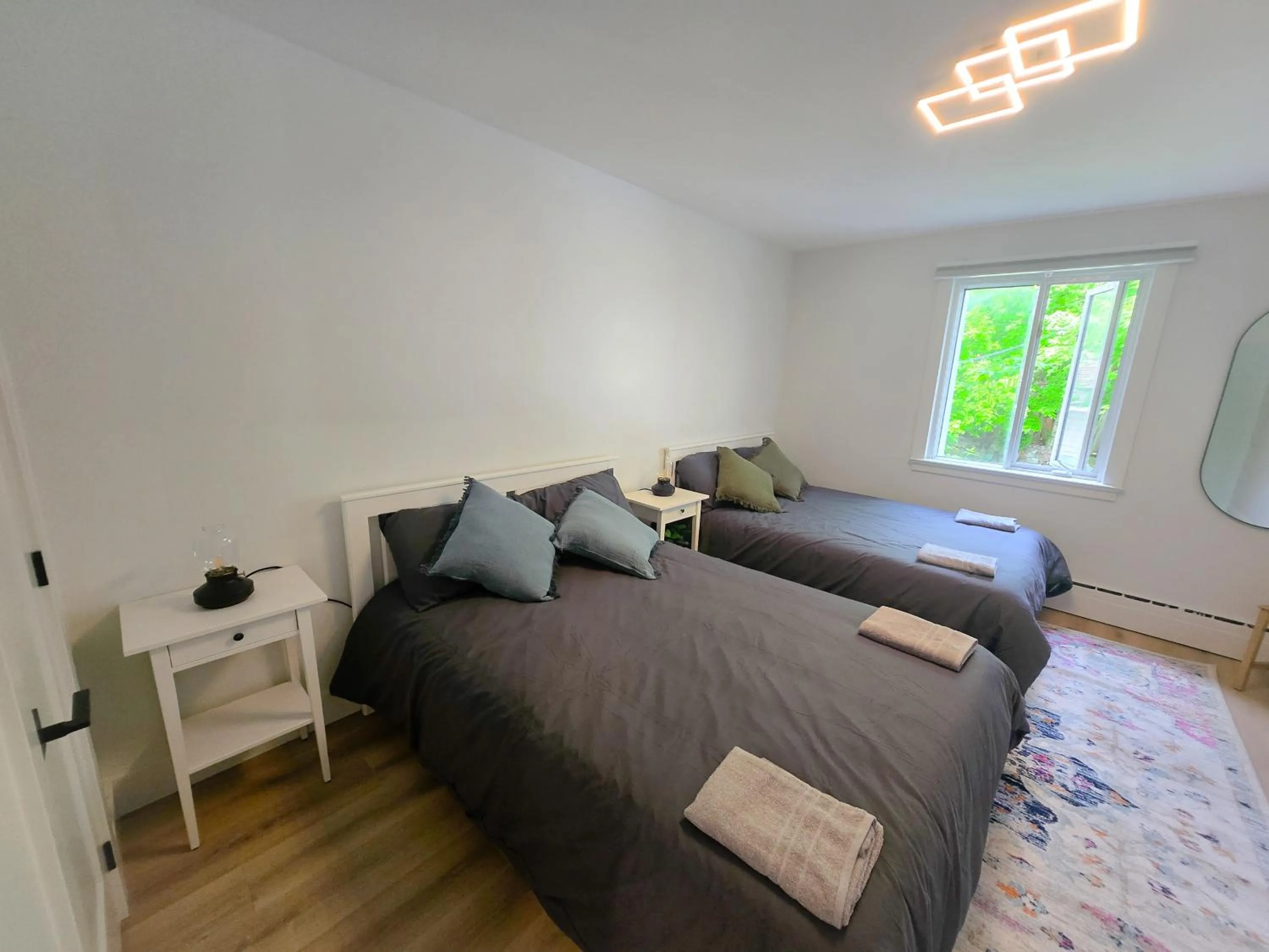 Bed in JstLikeHome - Serenity Suites & Guesthouse