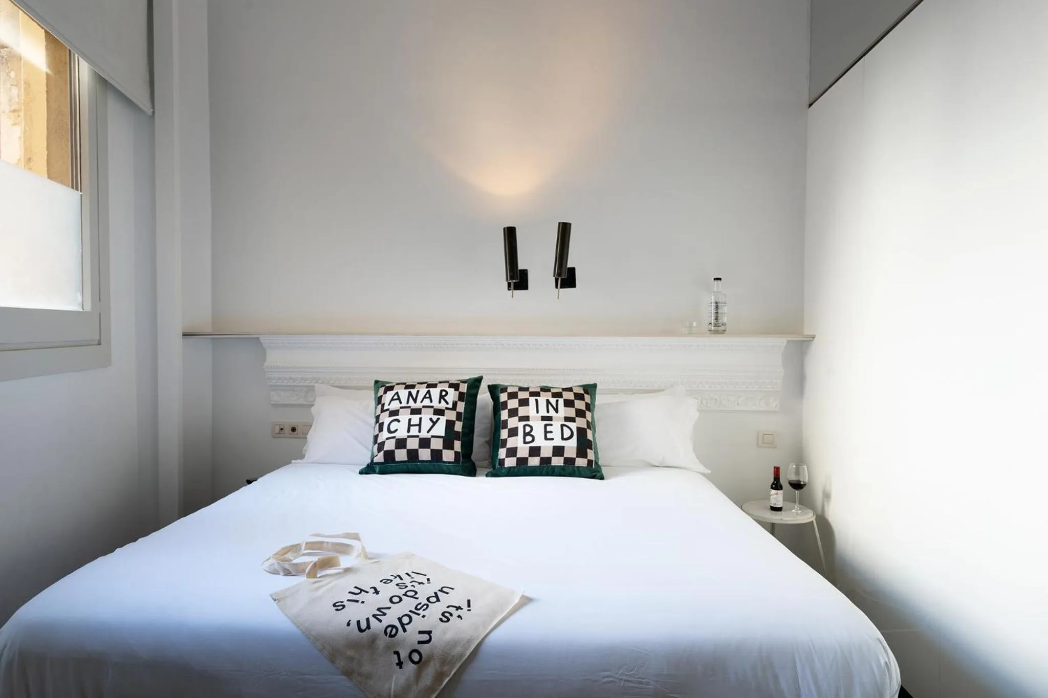 Bed in Chic & Basic Born Boutique Hotel