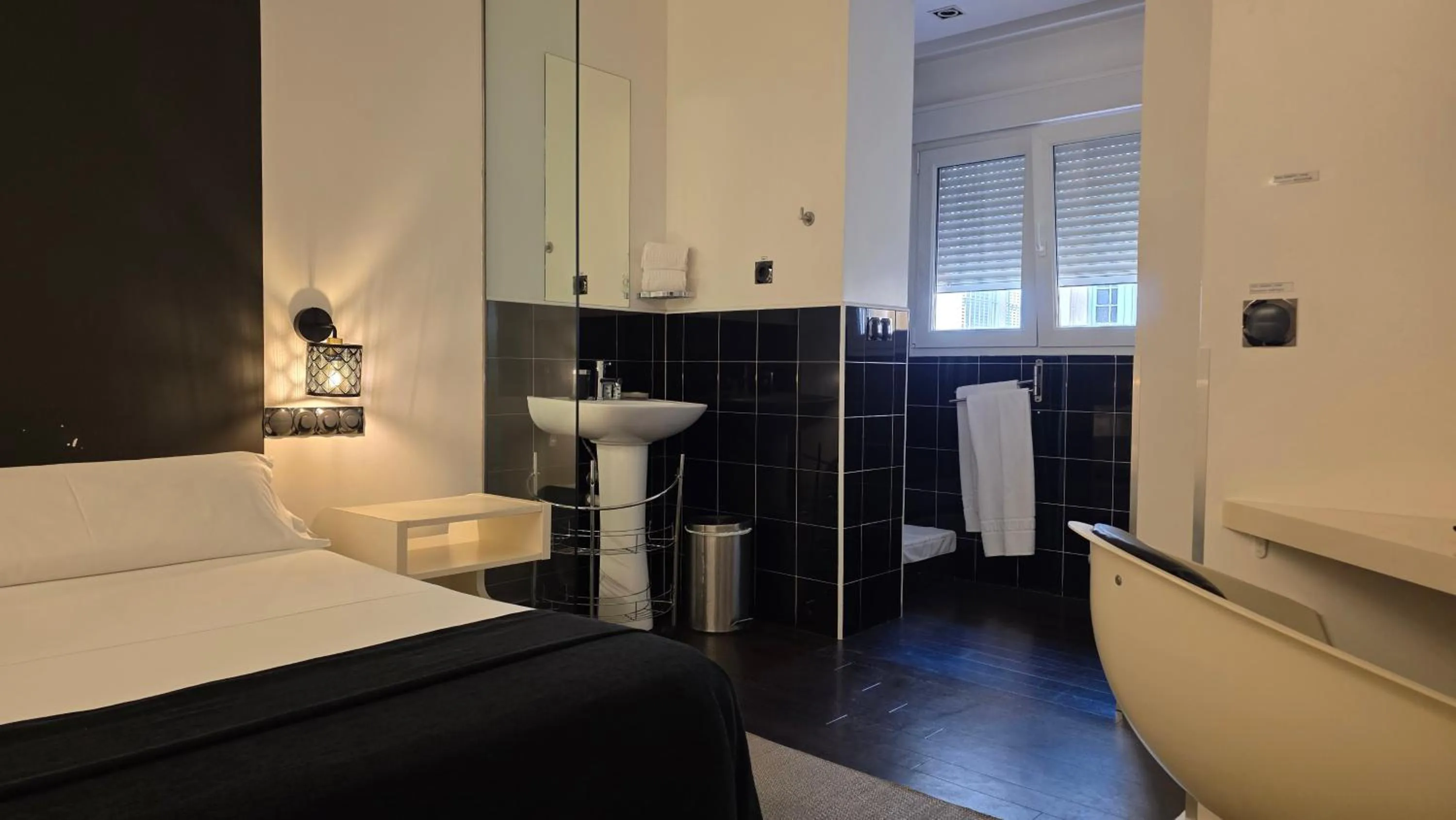 Bed in Hostal Santa Ana Colors