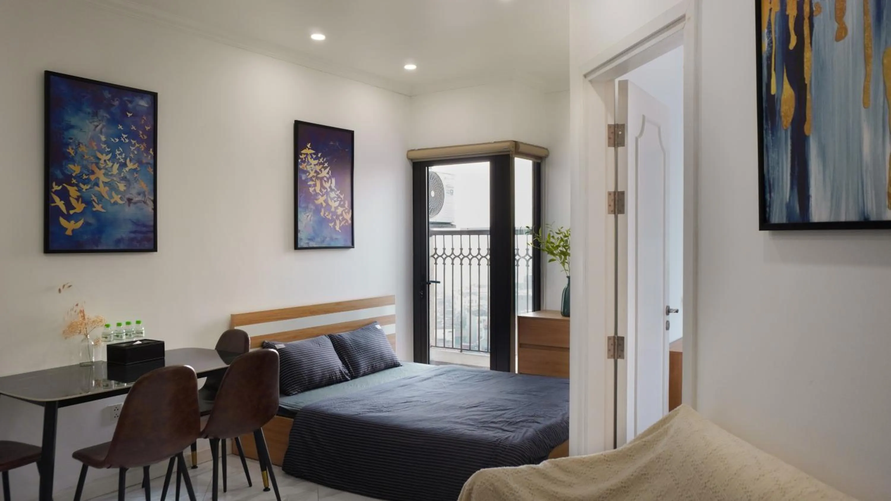 Living room, Bed in Muse Hanoi Lake View Luxury Apartment - D' Eldorado