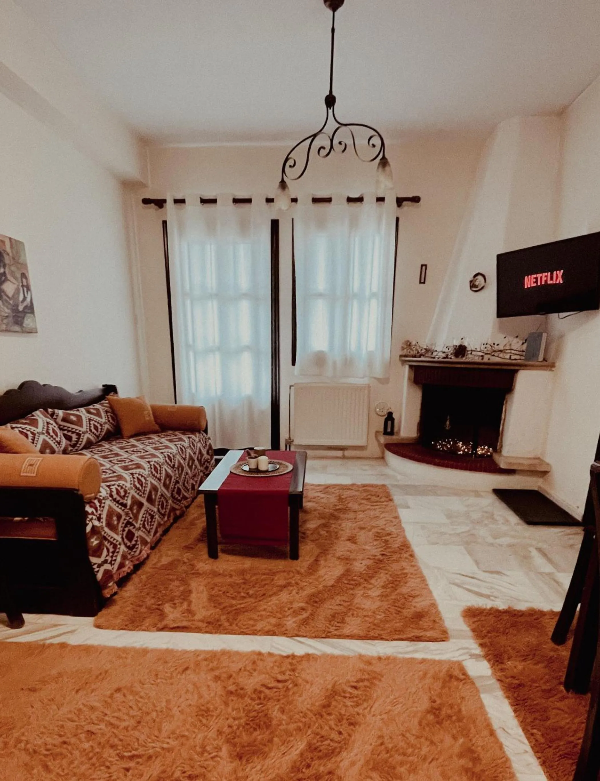 TV and multimedia, Bed in Muses Apartments