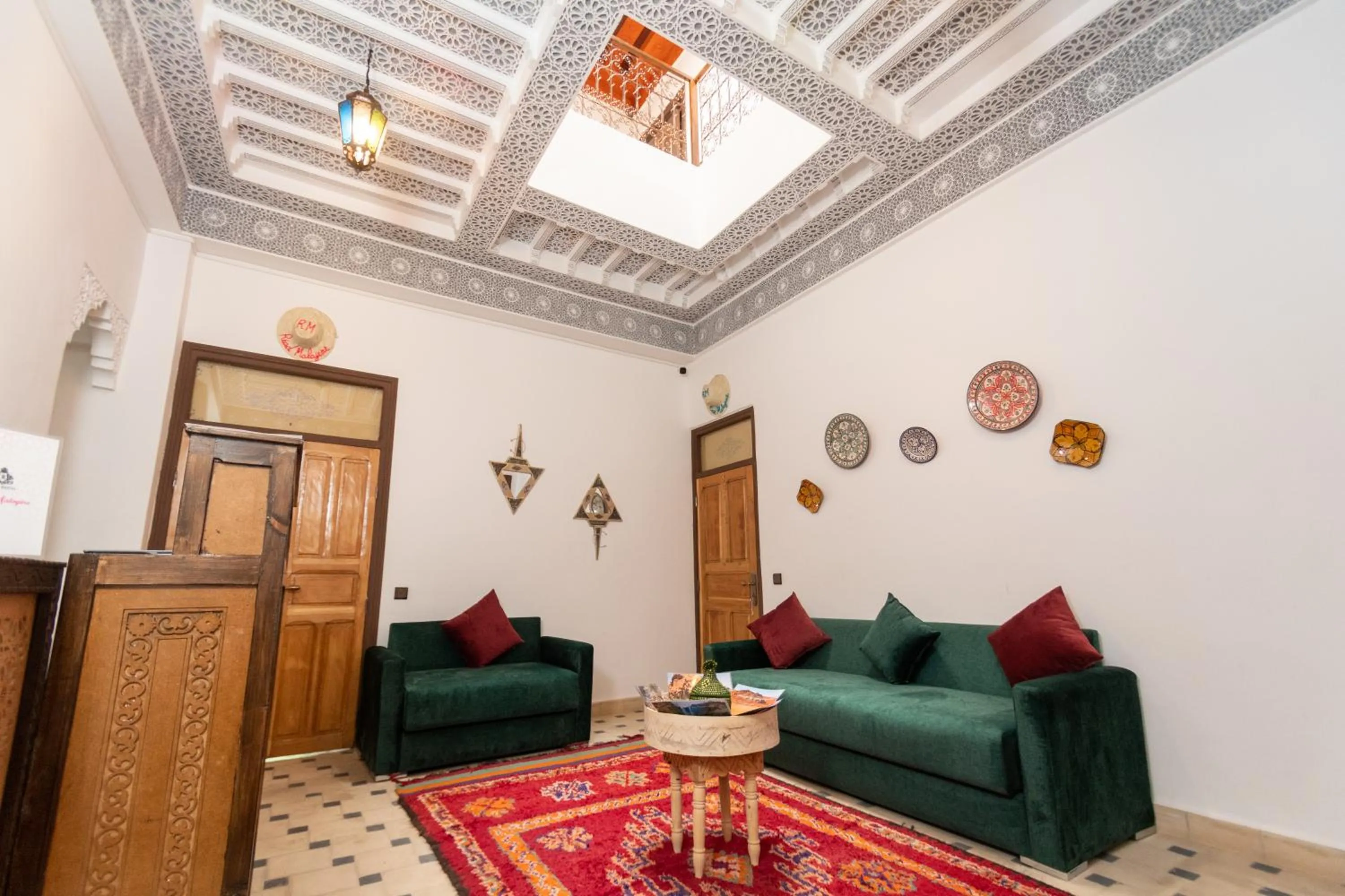 Communal lounge/ TV room in Riad Malayine
