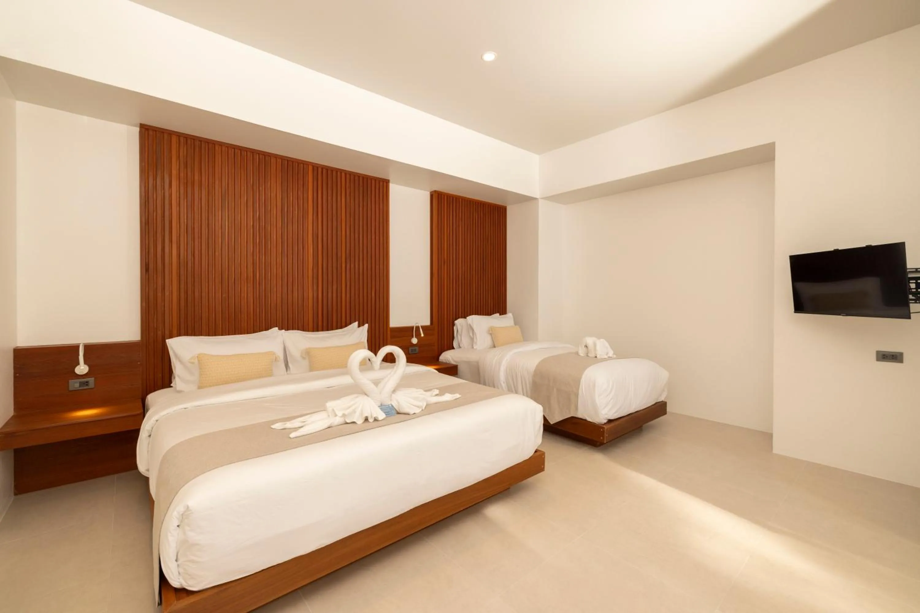 Bed in The AVA Resort Koh Tao