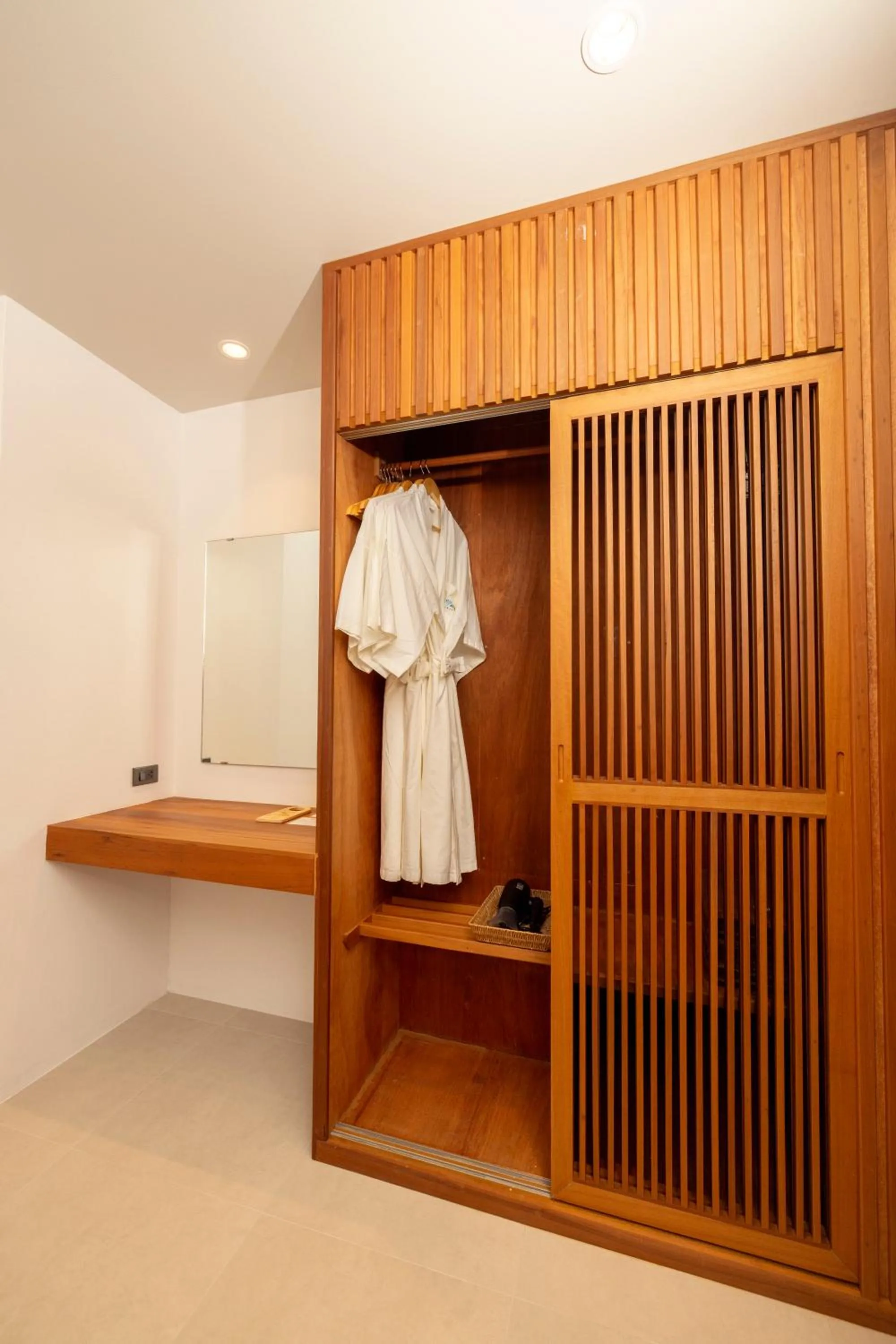 wardrobe in The AVA Resort Koh Tao