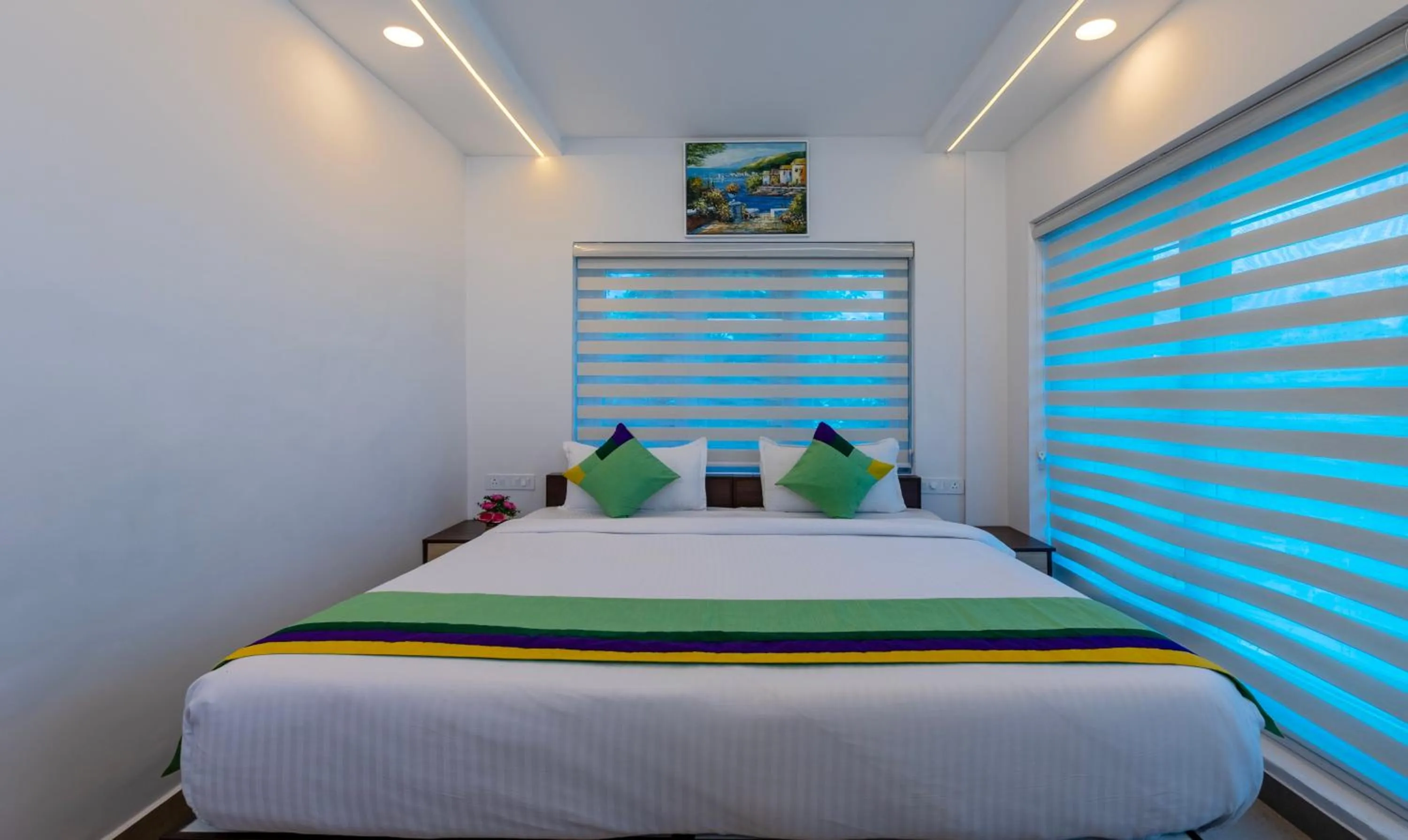 Bed in Treebo vSaffron Regency, Punnamada Lake