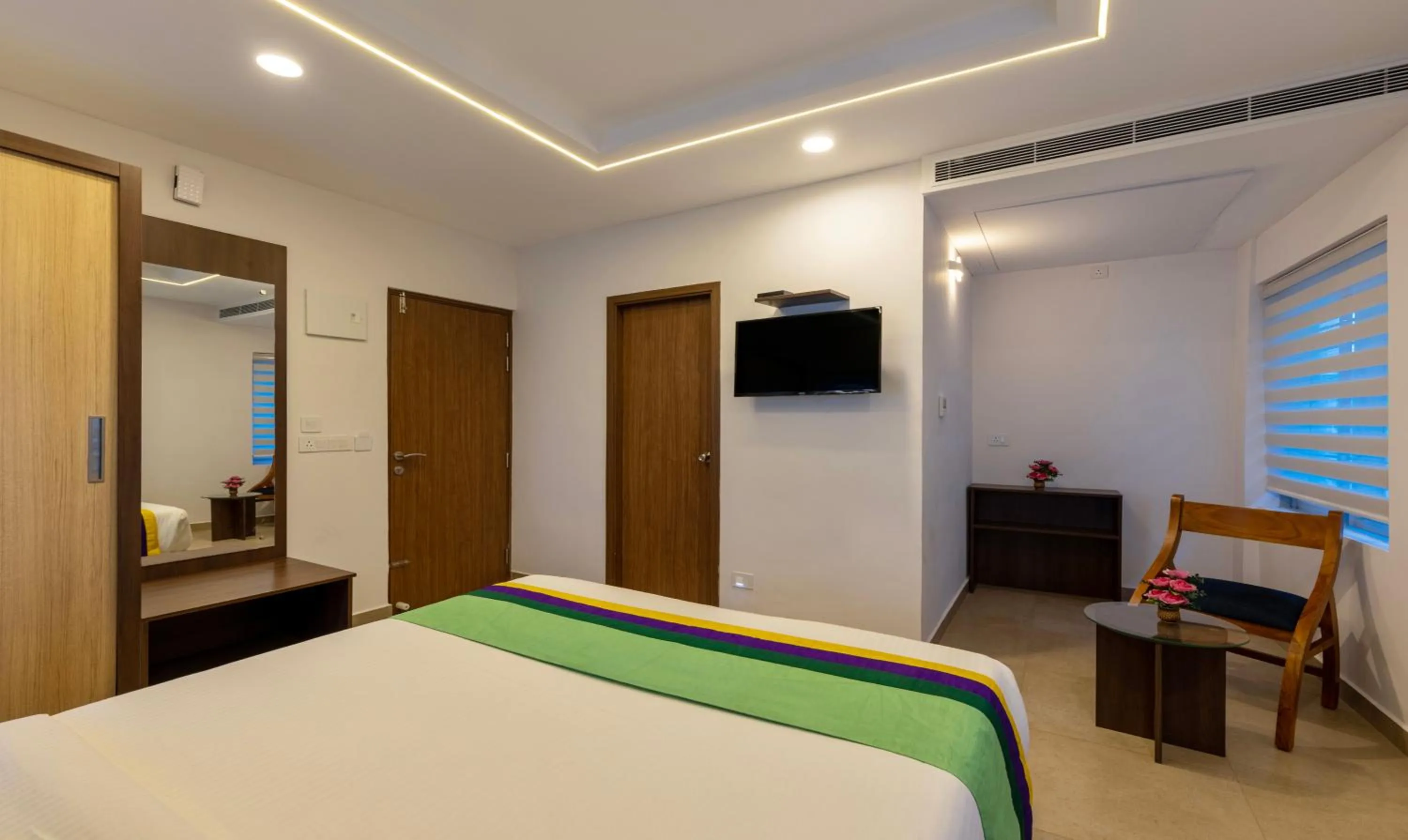 Bed in Treebo vSaffron Regency, Punnamada Lake