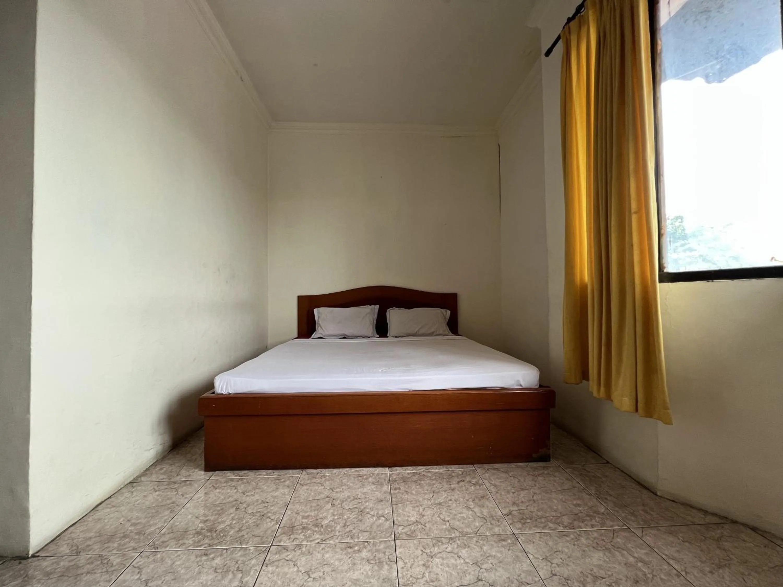 Bedroom, Bed in Hotel O Kost Orange Syariah
