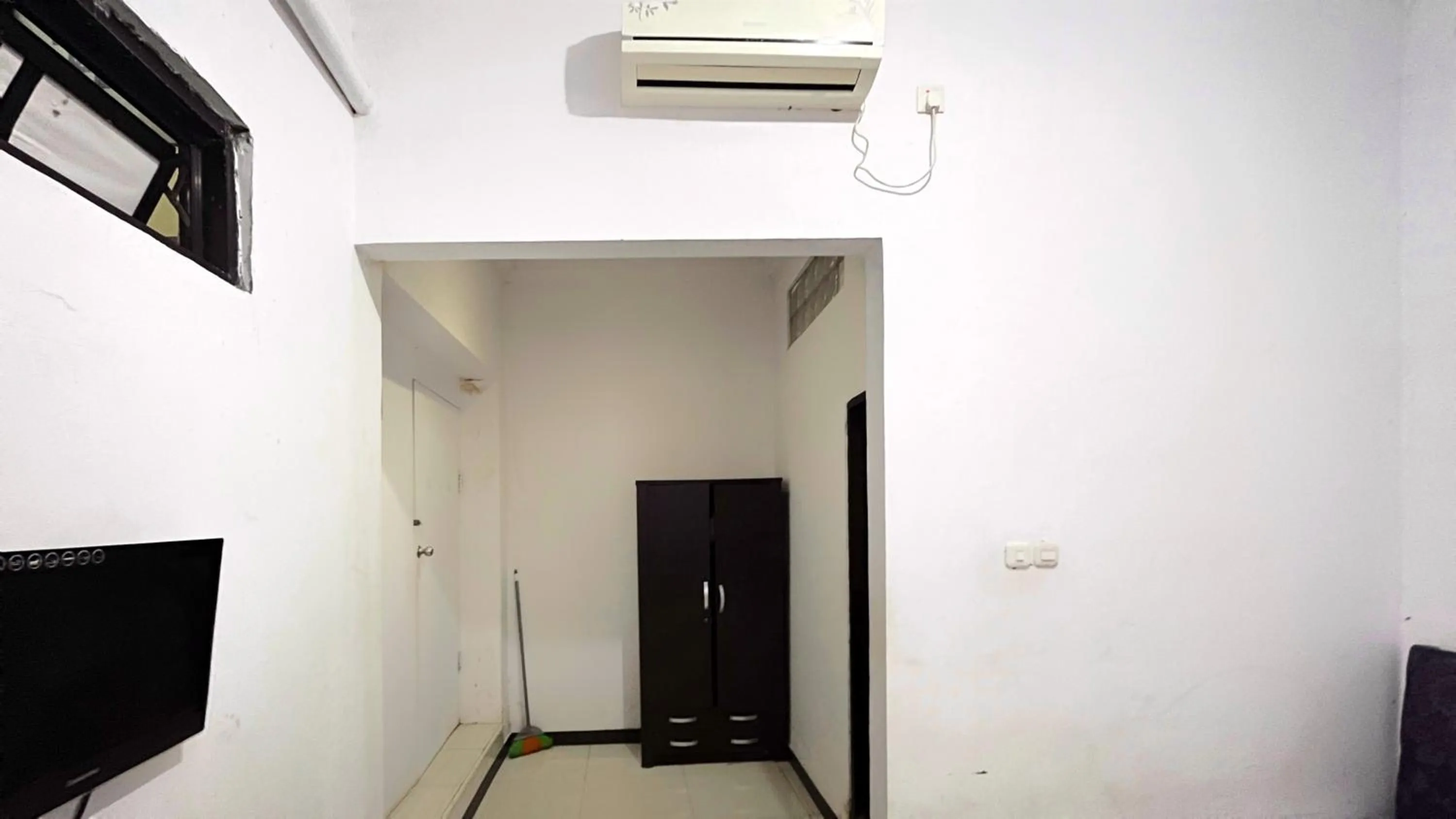 Bedroom in Hotel O Kost Biru