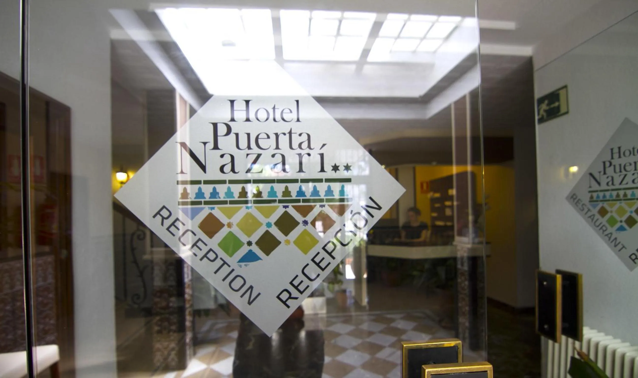 Property logo or sign in Hotel Puerta Nazarí