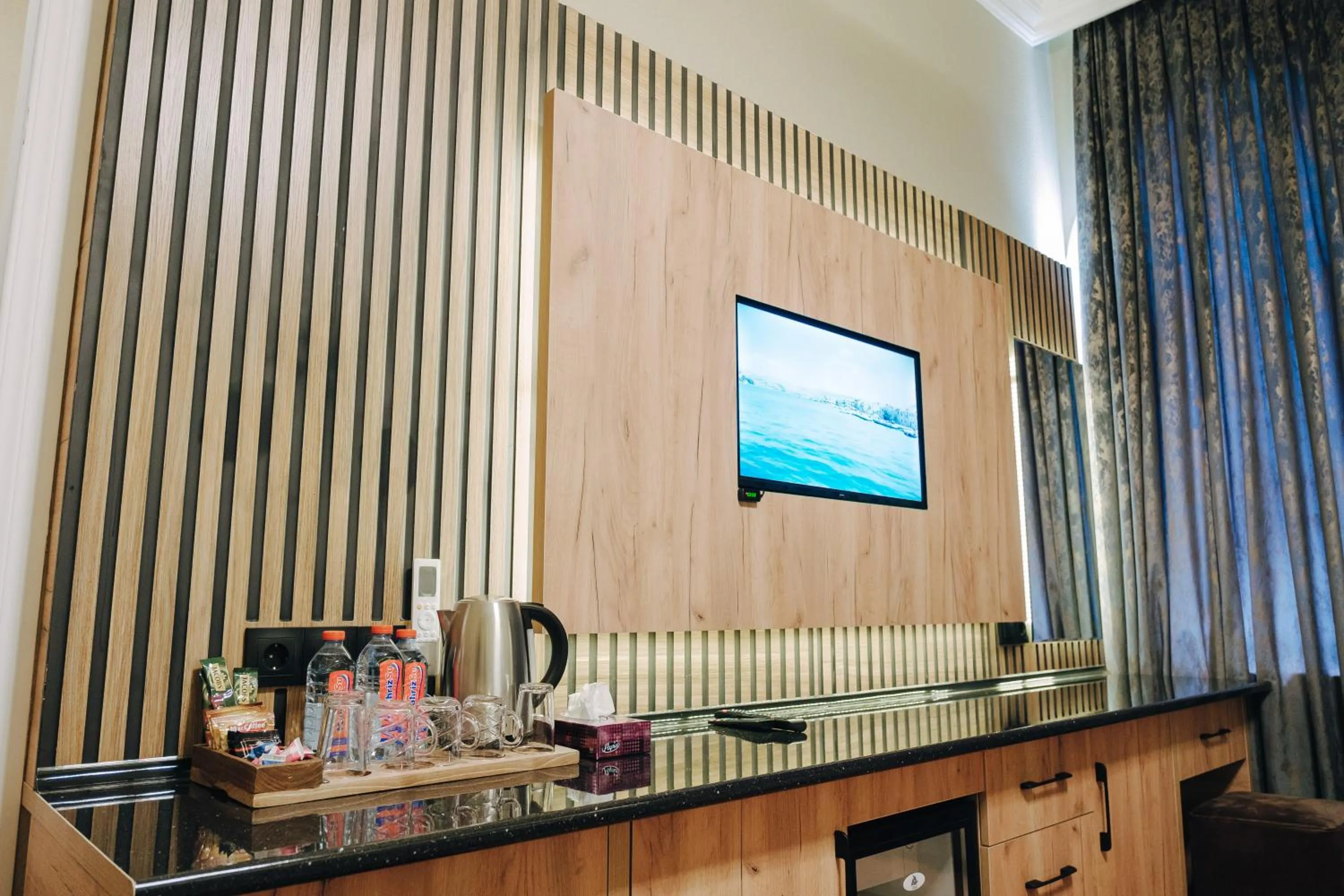 Communal lounge/ TV room in Old City Ganja