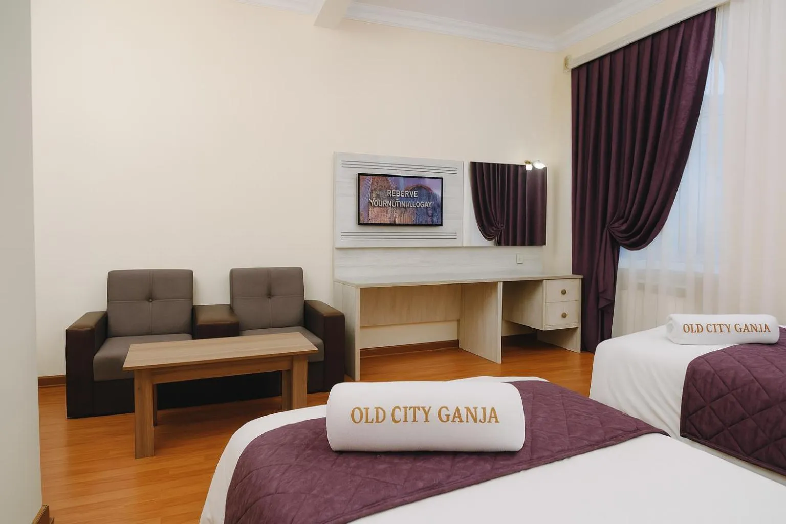 Communal lounge/ TV room, Bed in Old City Ganja