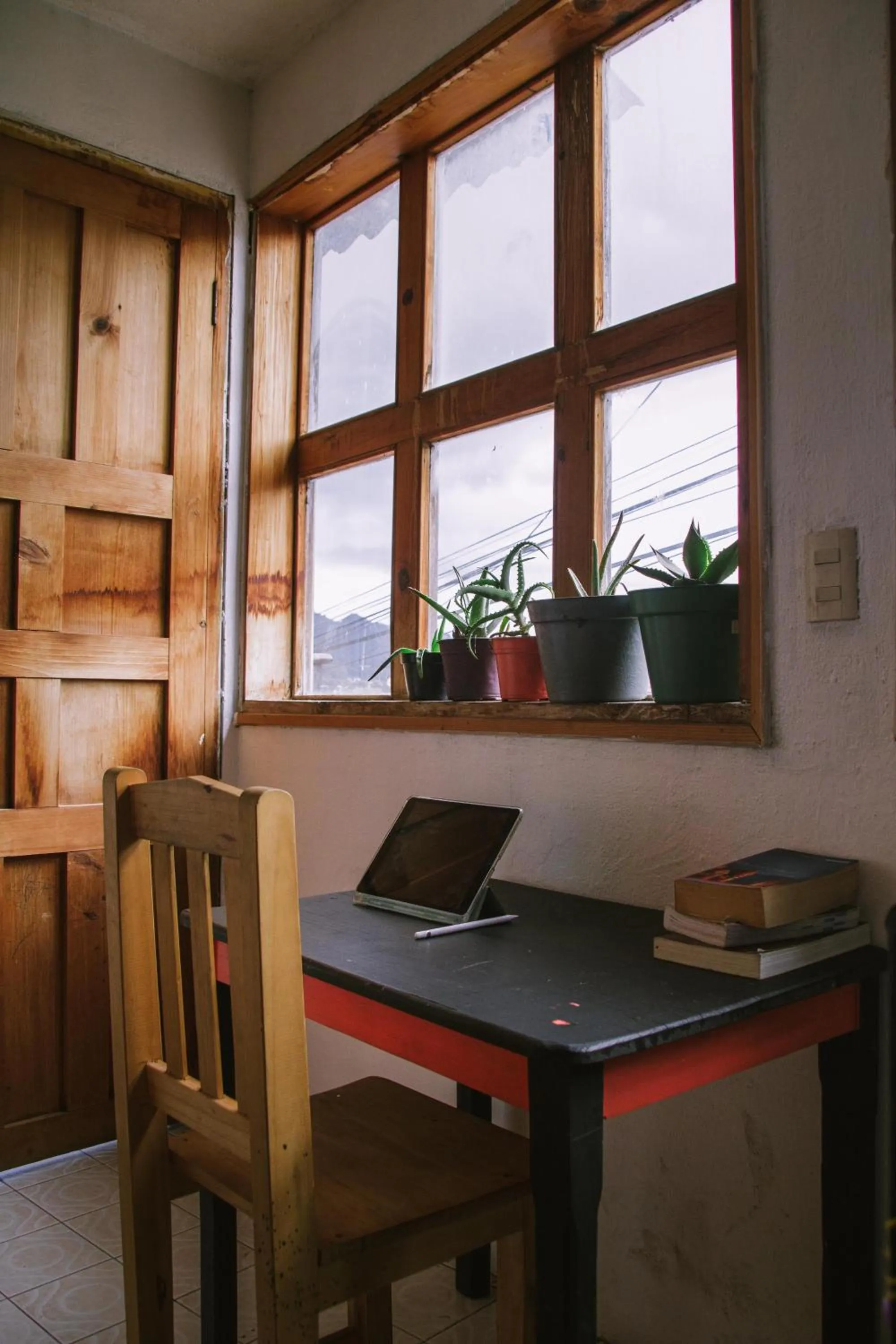 Communal lounge/ TV room in Casa Satoshi