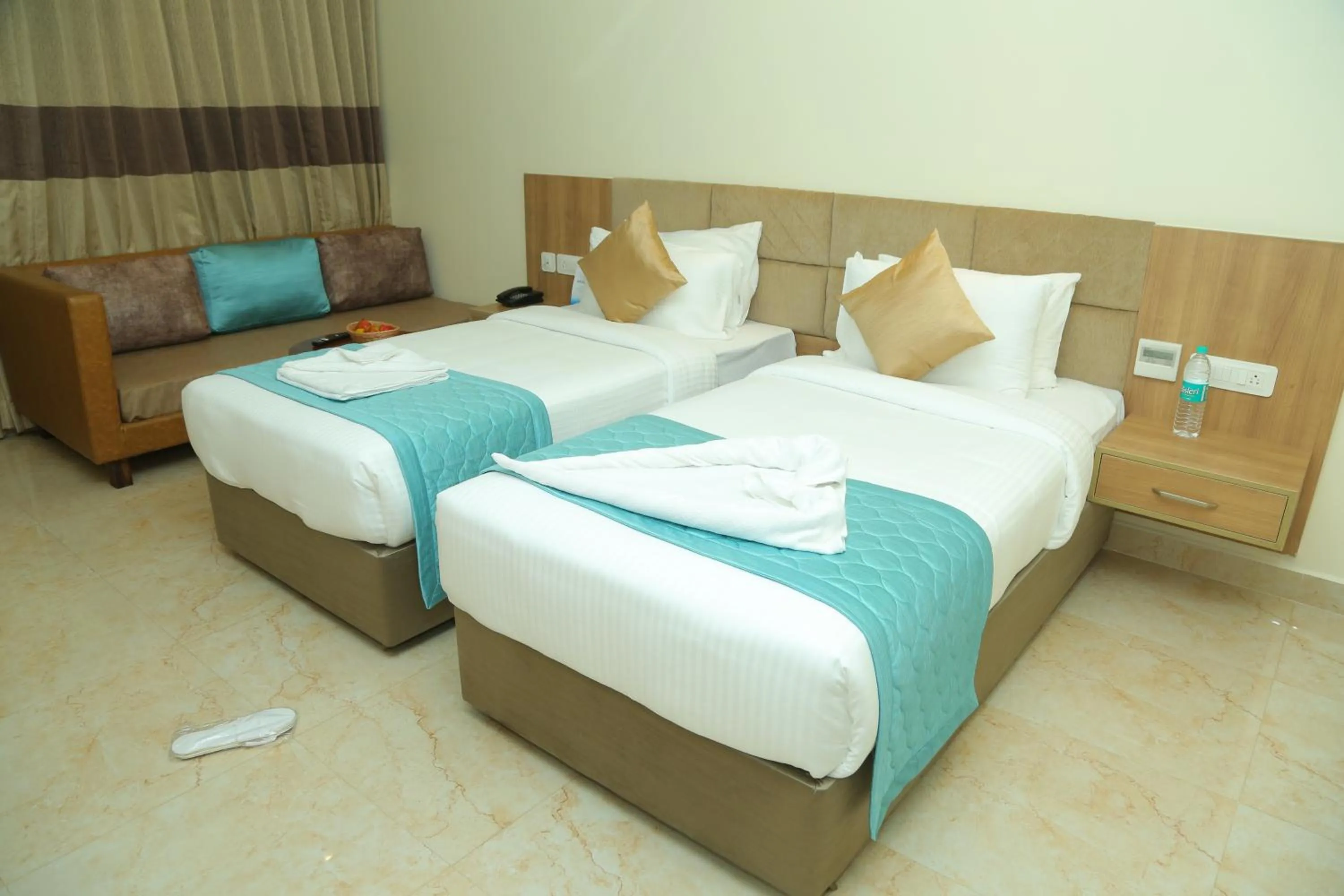 Bed in Misty Ocean - A Bergamont Group of Hotel