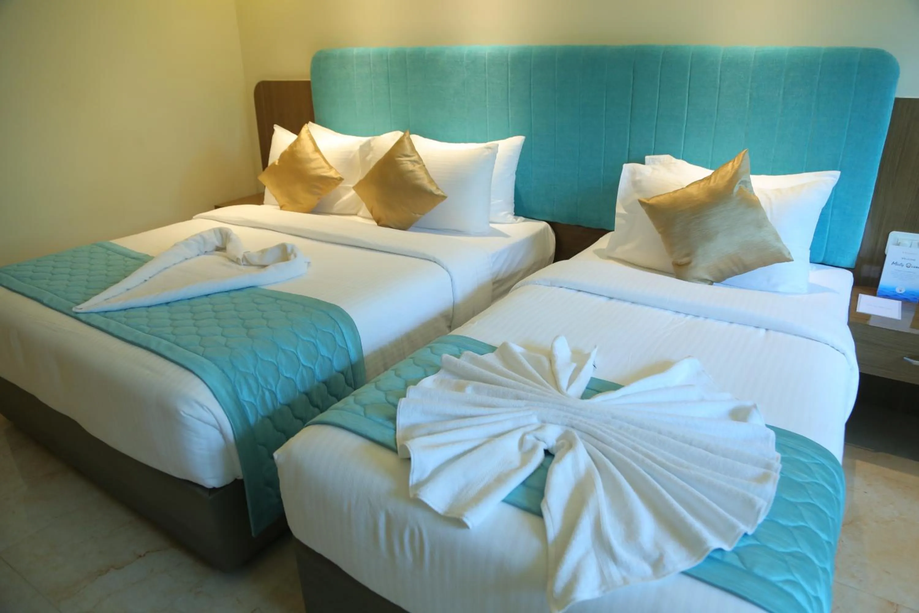 Bed in Misty Ocean - A Bergamont Group of Hotel