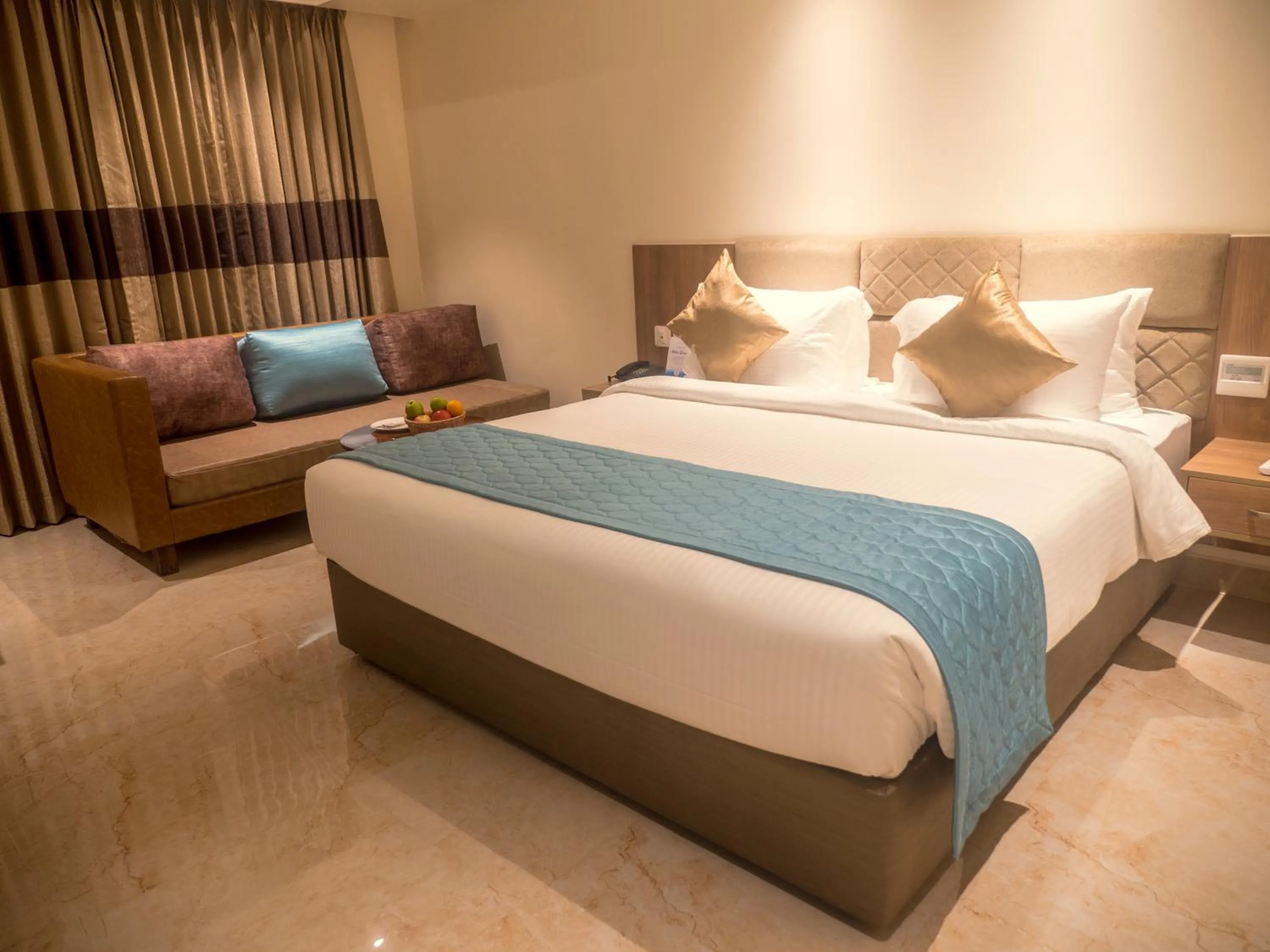 Bed in Misty Ocean - A Bergamont Group of Hotel