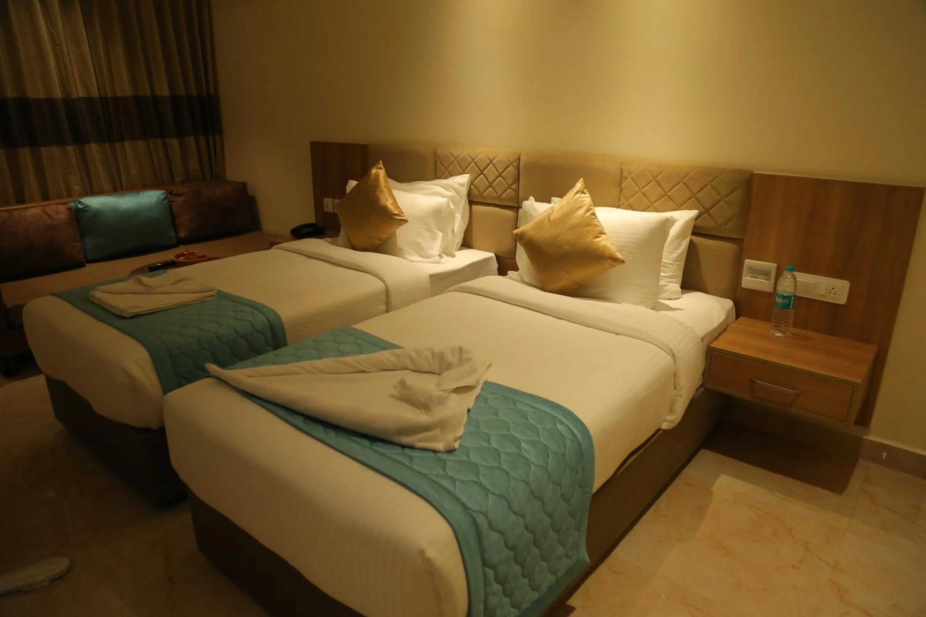 Bed in Misty Ocean - A Bergamont Group of Hotel