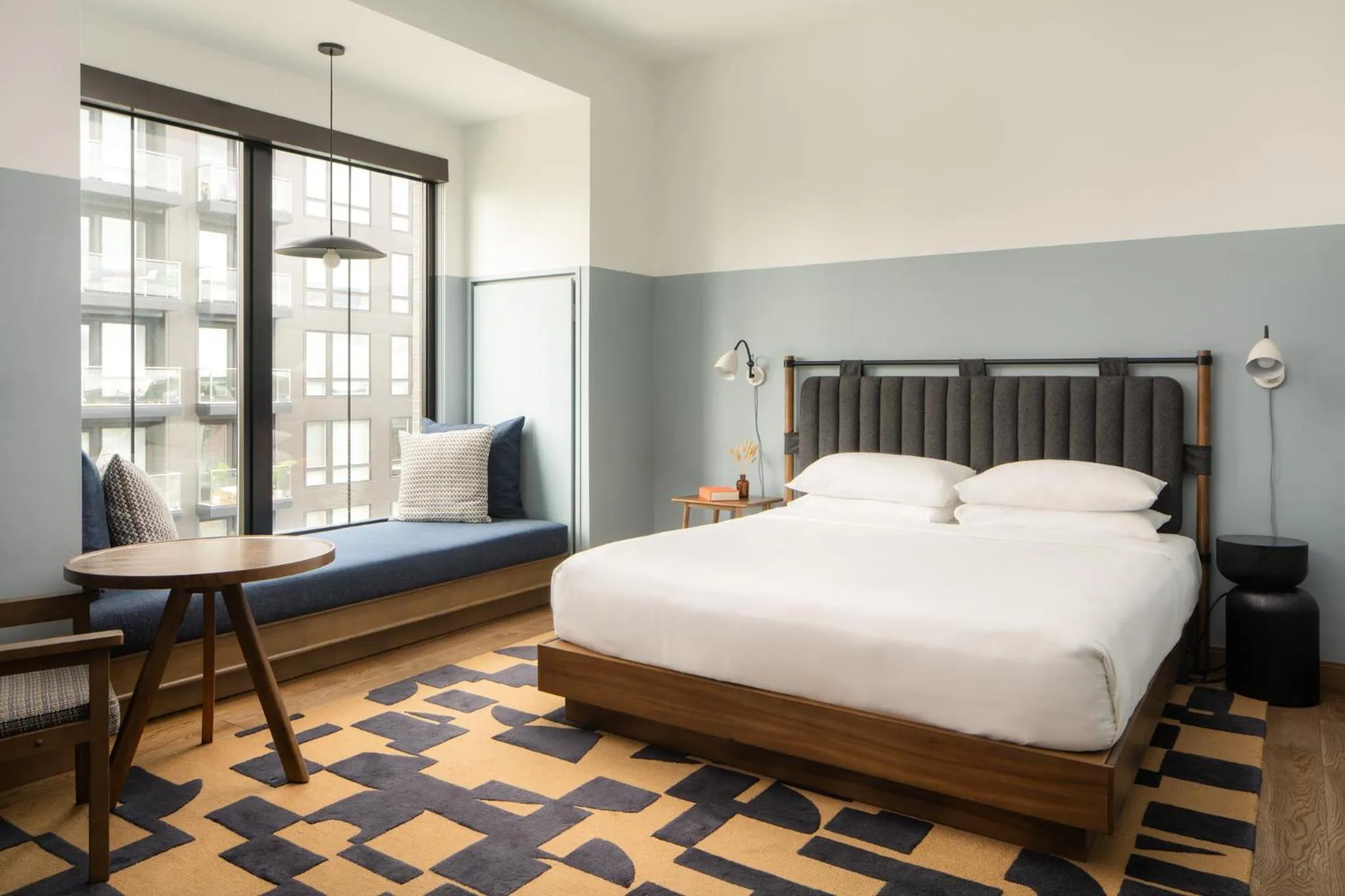 Bedroom in The Junto Hotel